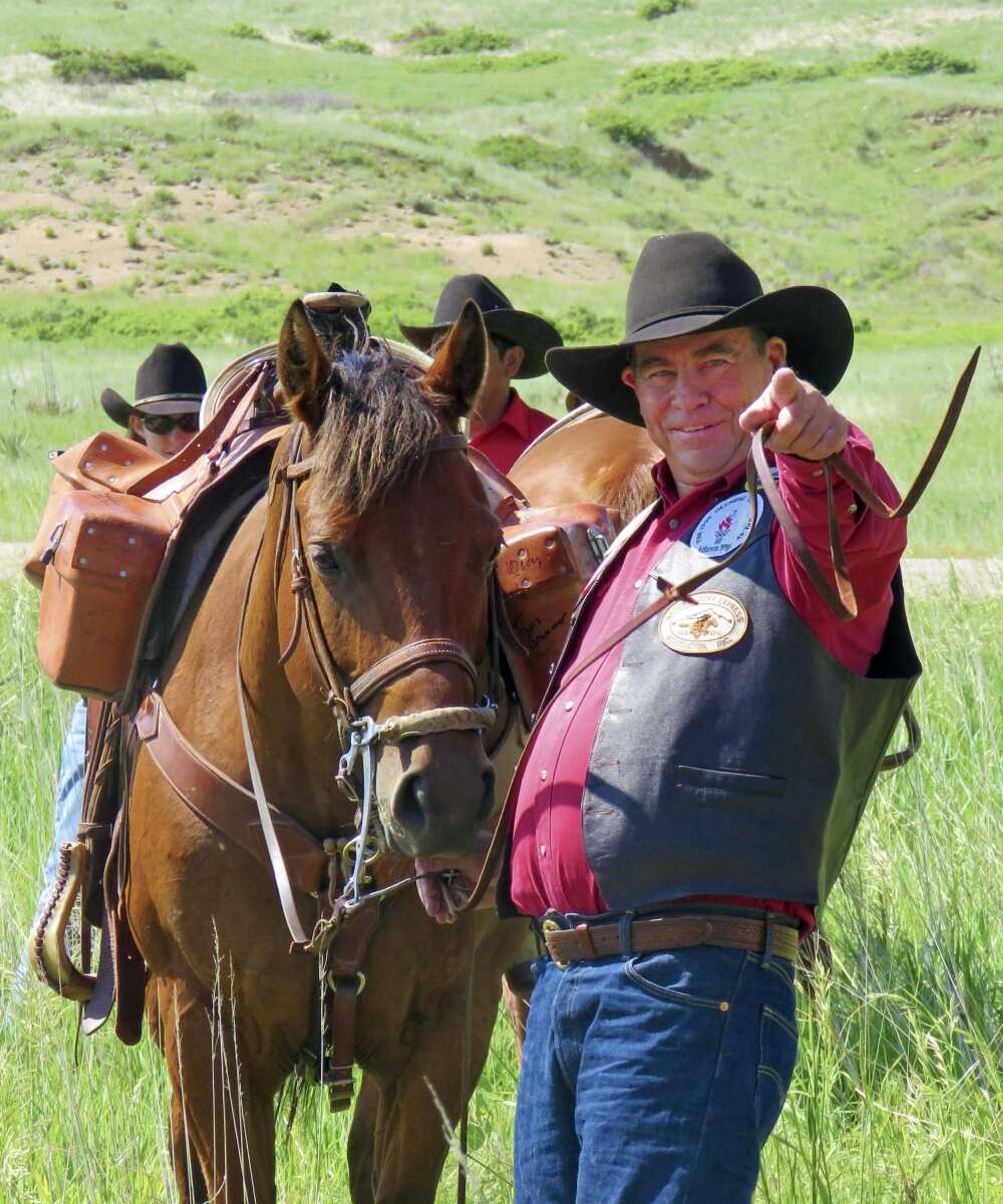 Max Cawiezel, who has been directing Pony Express re-ride participants for nearly 30 years, gestures June 7, 2017, in Scottsbluff, Nebraska.