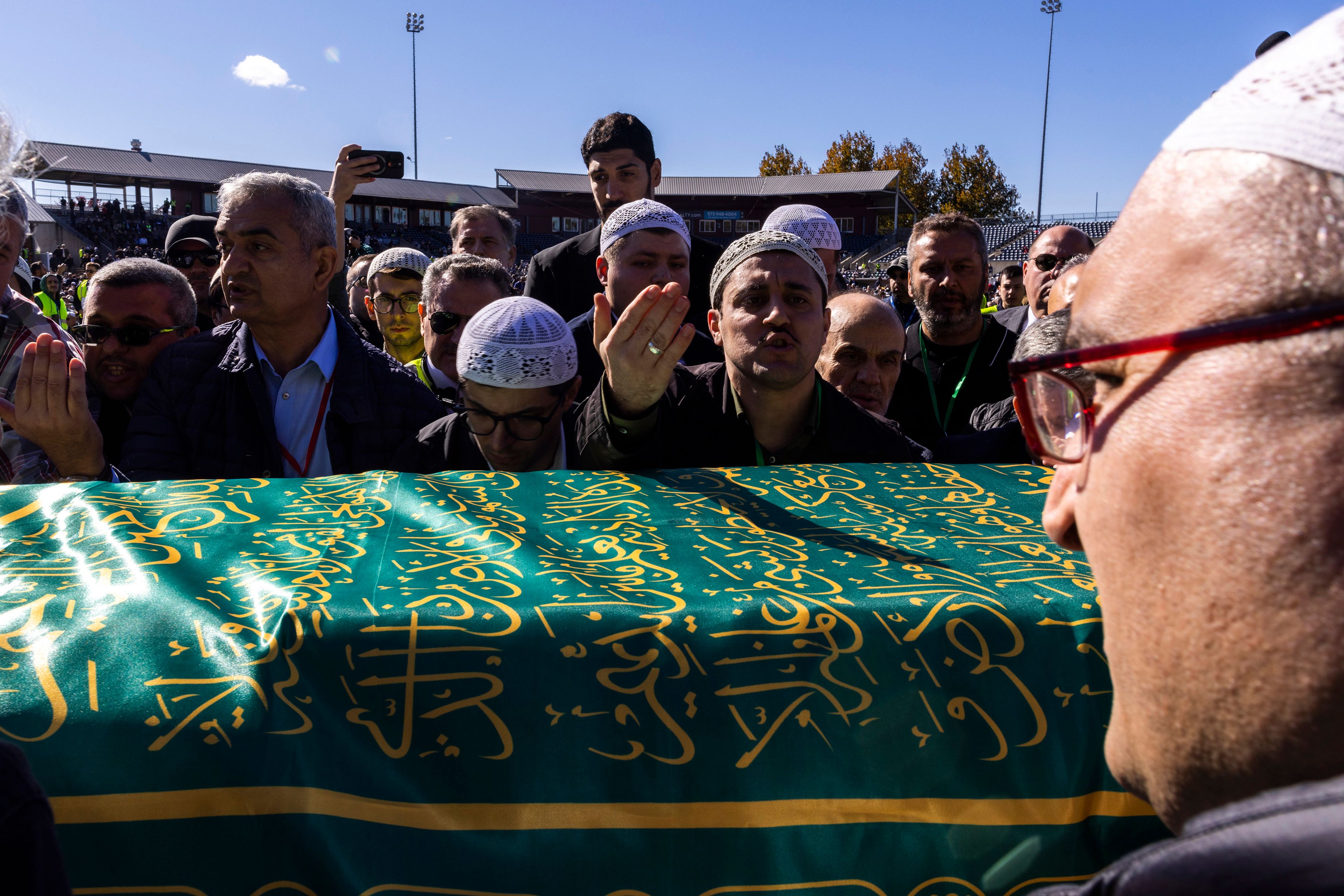 Mourners carry the casket of Fethullah Gülen, an influential Turkish spiritual leader and Islamic scholar who died this week in self-exile in the United States, at a funeral prayer service, Thursday, Oct, 24, 2024, in Augusta, N.J. (AP Photo/Eduardo Munoz Alvarez)