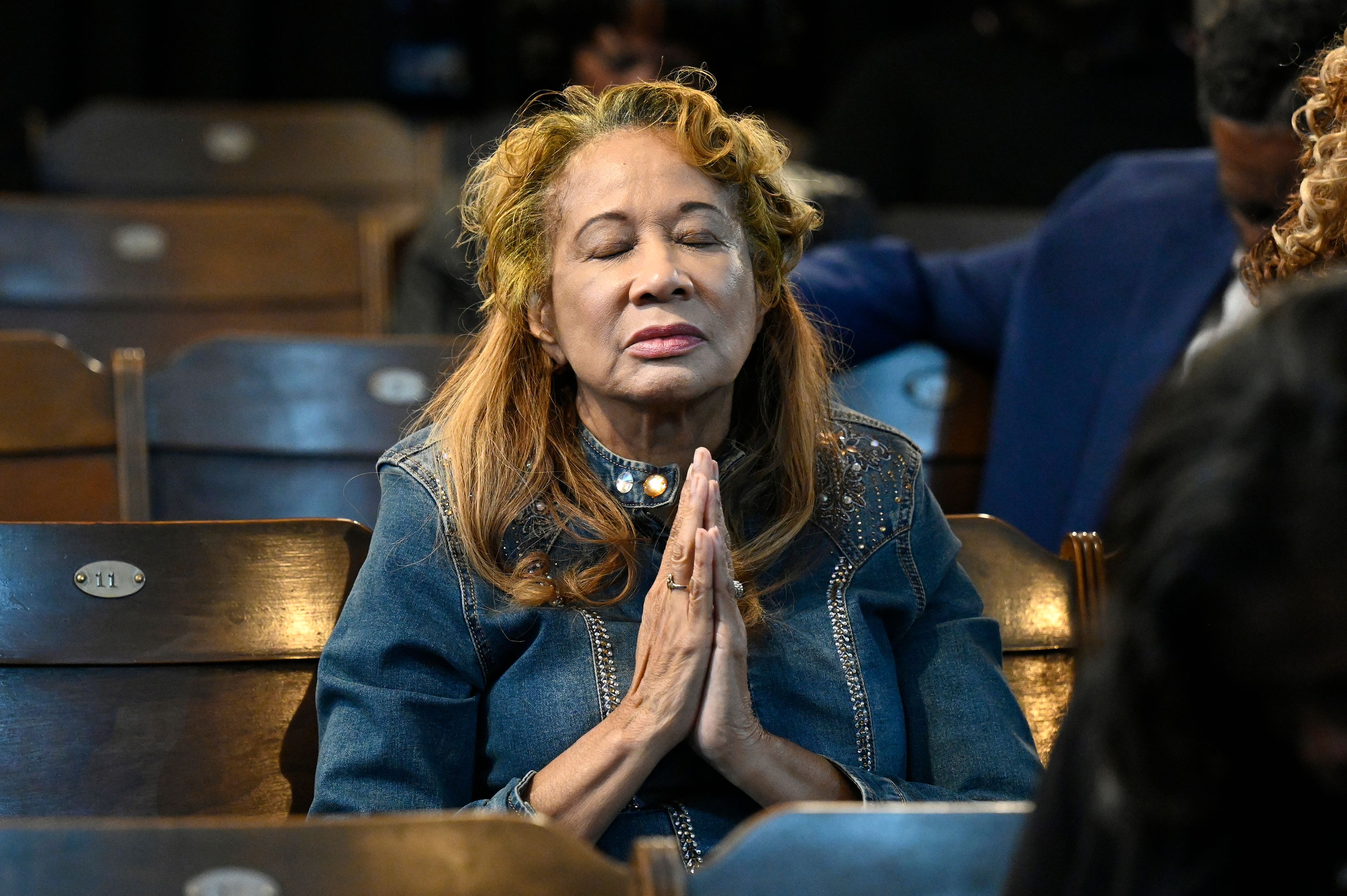 Michelle Rhea Greene prays as election results are played on a giant screen at Historic King Solomon Baptist Church in Detroit, Tuesday, Nov. 5, 2024. (AP Photo/Jose Juarez)