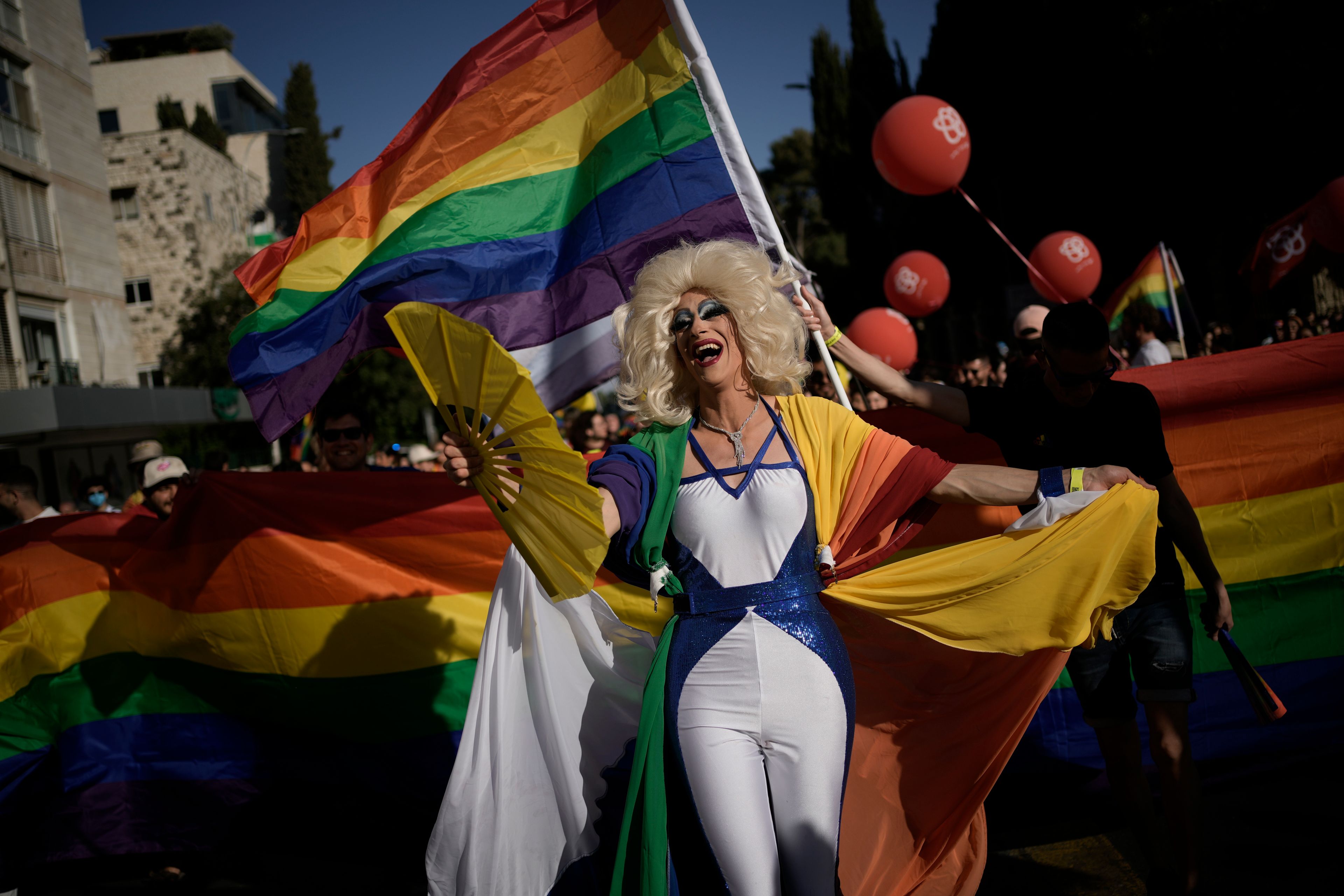 People participate in the annual Pride parade in Jerusalem, Thursday, May 30, 2024. (AP Photo/Leo Correa)