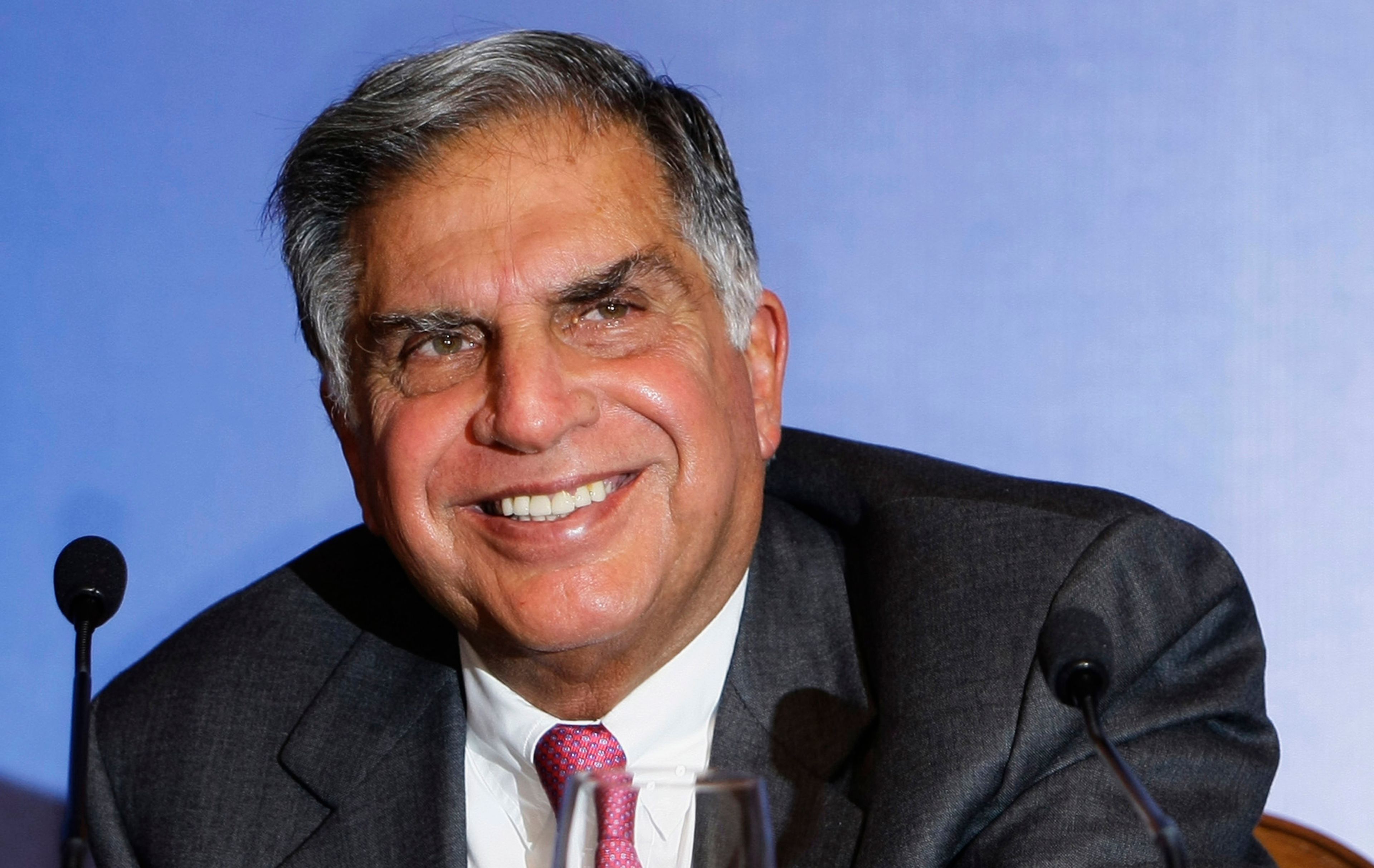 FILE - Tata Sons Chairman Ratan Tata reacts as he speaks during a press conference prior to the launch event of the Tata Nano in Mumbai, India, March 23, 2009. (AP Photo/Gautam Singh, File)