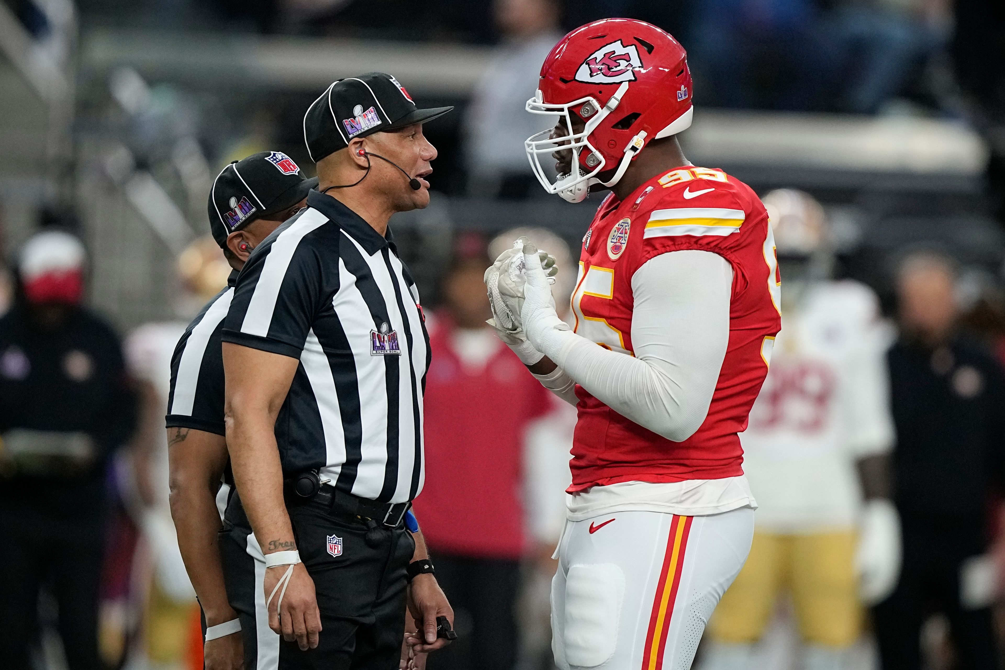 Kansas City Chiefs defensive tackle Chris Jones, right, talks with officials during the first half of the NFL Super Bowl 58 football game against the San Francisco 49ers on Sunday, Feb. 11, 2024, in Las Vegas. (AP Photo/Brynn Anderson)