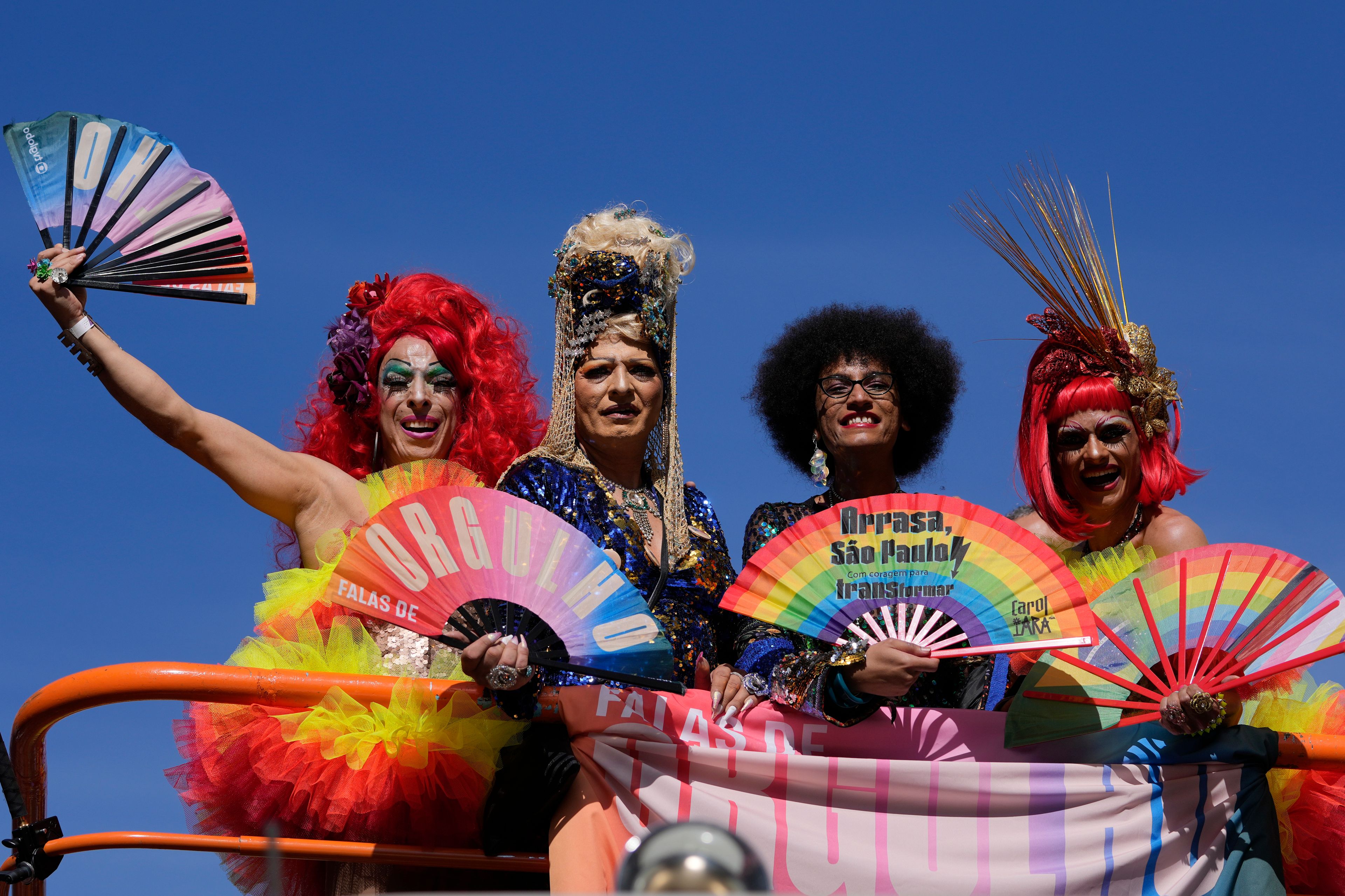Revelers take part in the annual Pride Parade in Sao Paulo, Sunday, June 2, 2024. (AP Photo/Andre Penner)