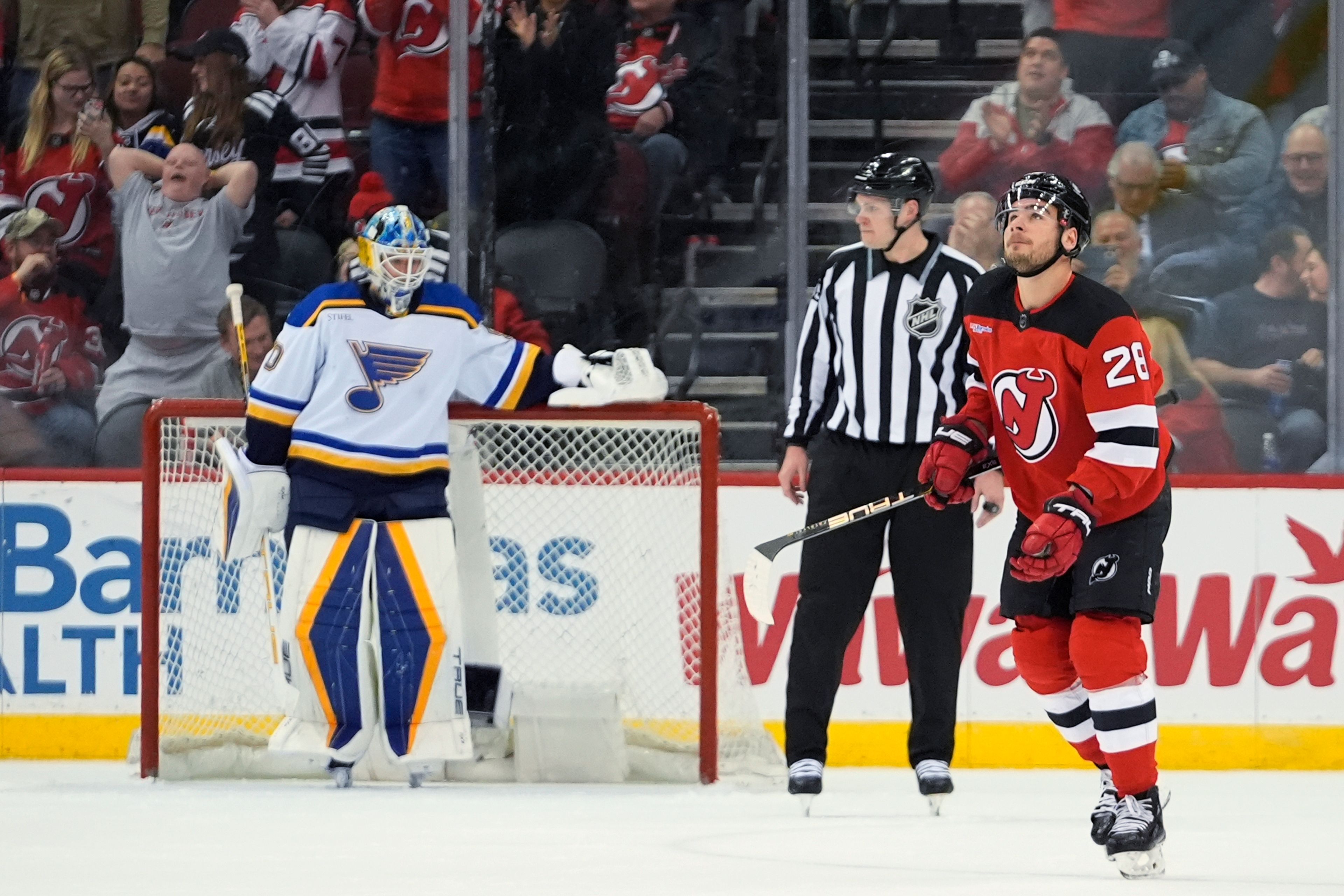 New Jersey Devils' Timo Meier looks up at a replay after scoring on St. Louis Blues' Jordan Binnington during the first period of an NHL hockey game Thursday, March 7, 2024, in Newark, N.J. (AP Photo/Frank Franklin II)