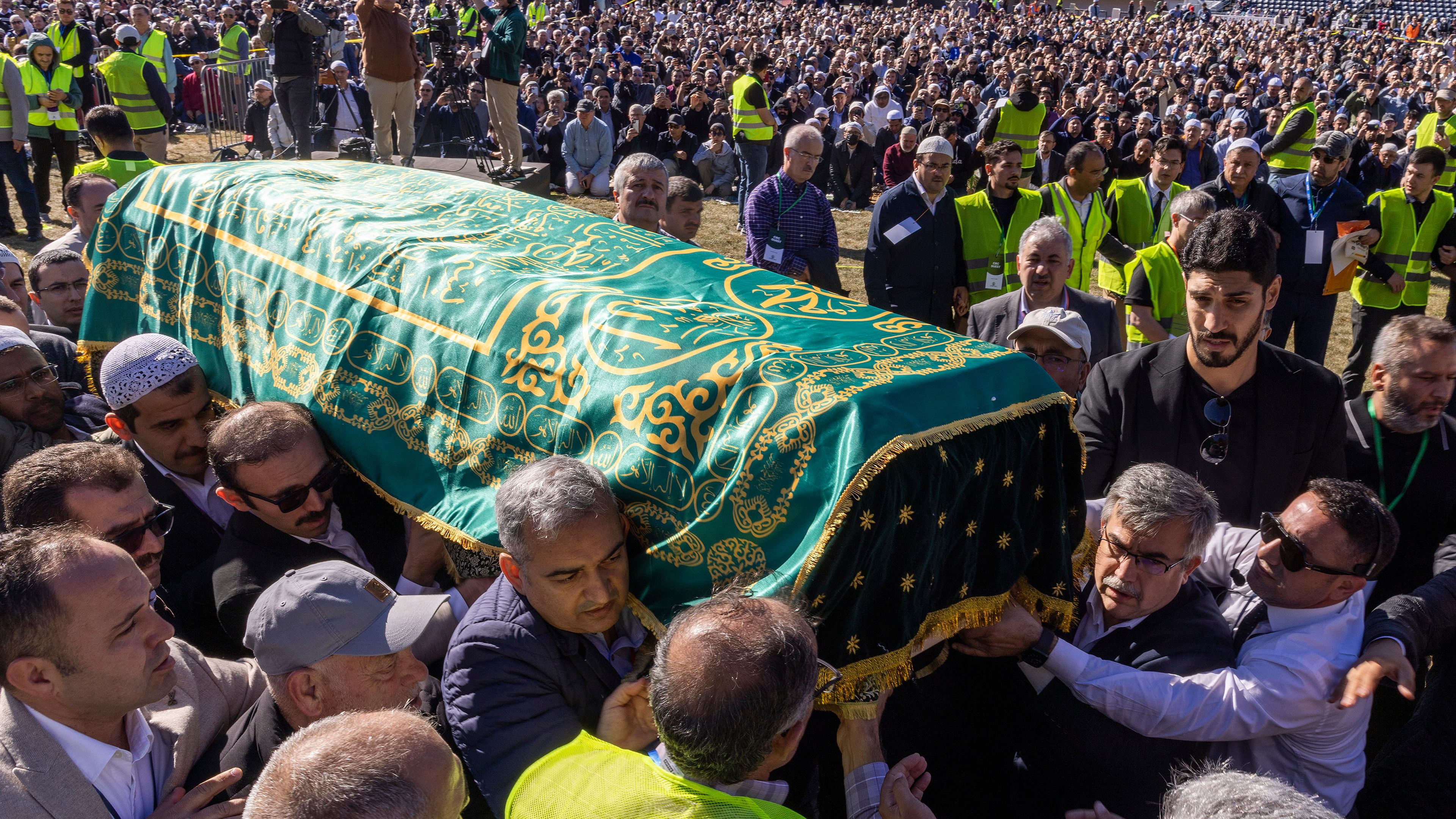 Mourners carry the casket of Fethullah Gülen, an influential Turkish spiritual leader and Islamic scholar who died this week in self-exile in the United States, at a funeral prayer service, Thursday, Oct, 24, 2024, in Augusta, N.J. (AP Photo/Eduardo Munoz Alvarez)