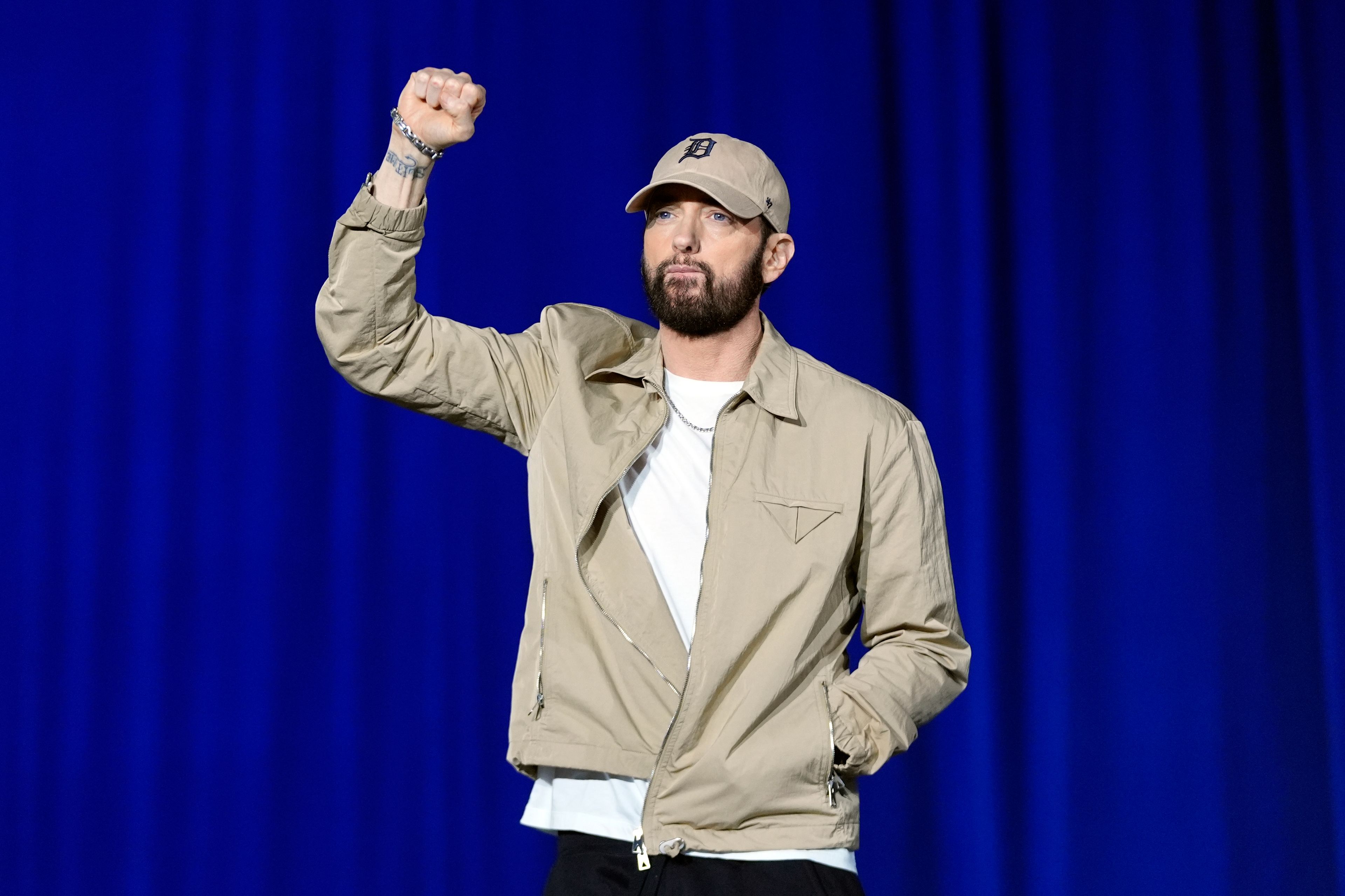 Rapper Eminem arrives to speak before former President Barack Obama at a campaign rally supporting Democratic presidential nominee Vice President Kamala Harris, Tuesday, Oct. 22, 2024, in Detroit. (AP Photo/Paul Sancya)