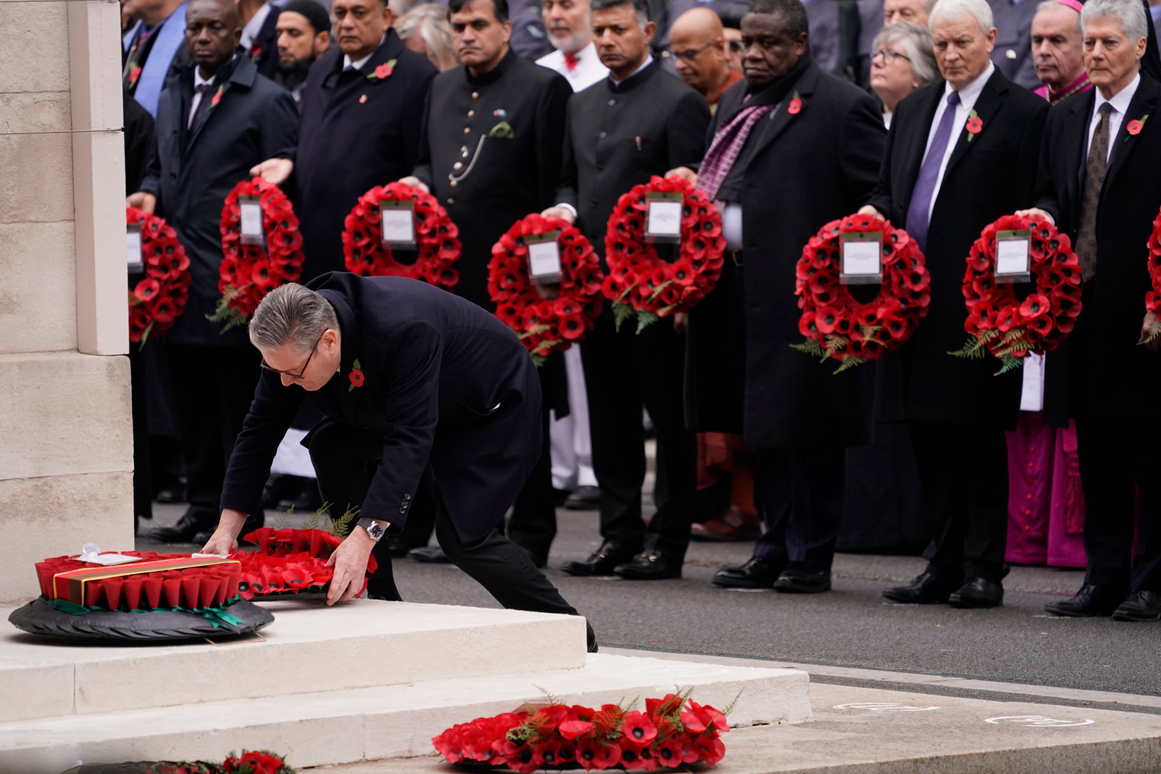 Britain's Prime Minister Keir Starmer lays a wreath during the Remembrance Sunday Service at the Cenotaph in London, Sunday, Nov. 10, 2024. (AP Photo/Alberto Pezzali)