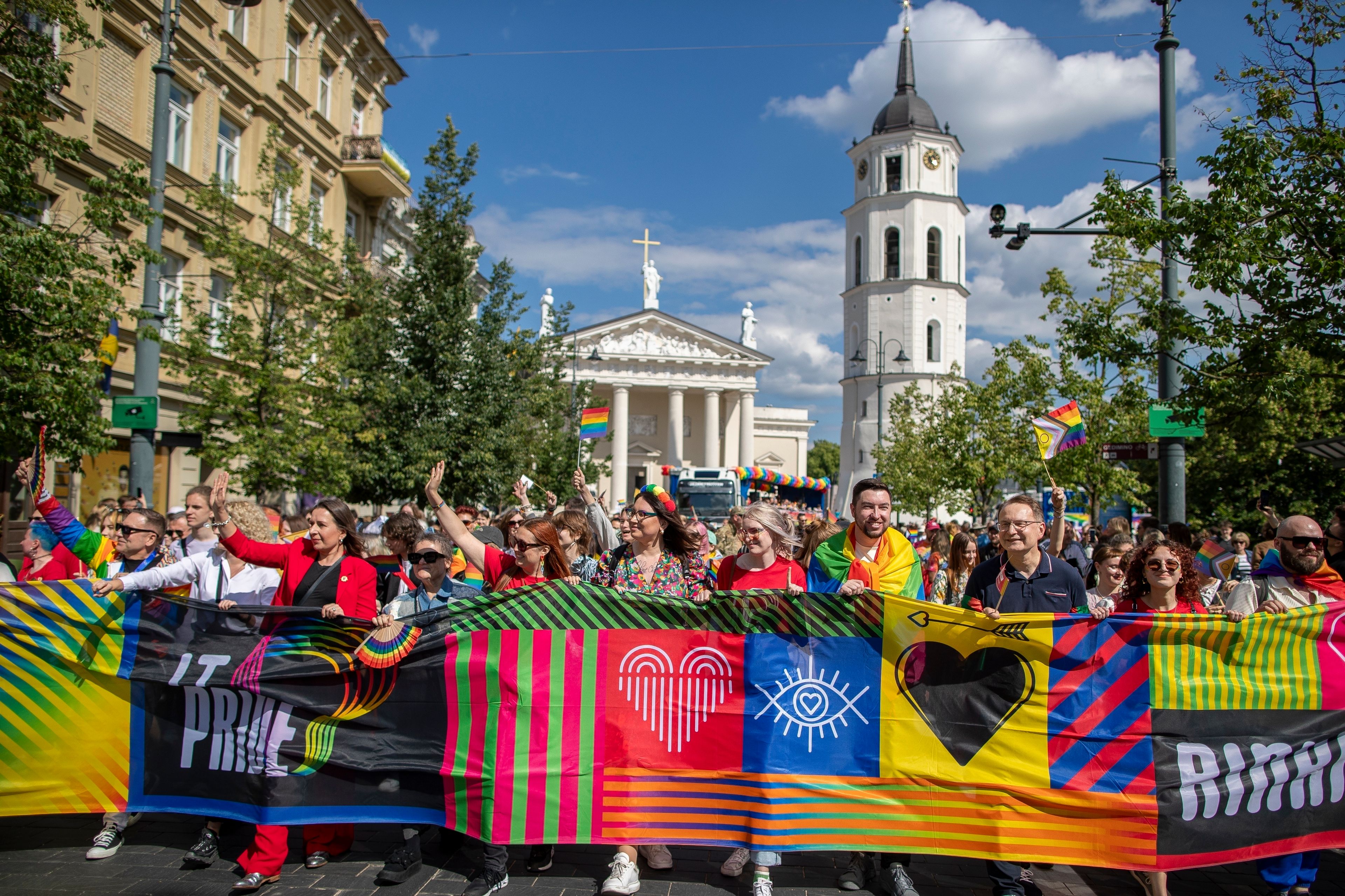 Revelers take part in the Pride March in Vilnius, Lithuania, Saturday, June 8, 2024. (AP Photo/Mindaugas Kulbis)