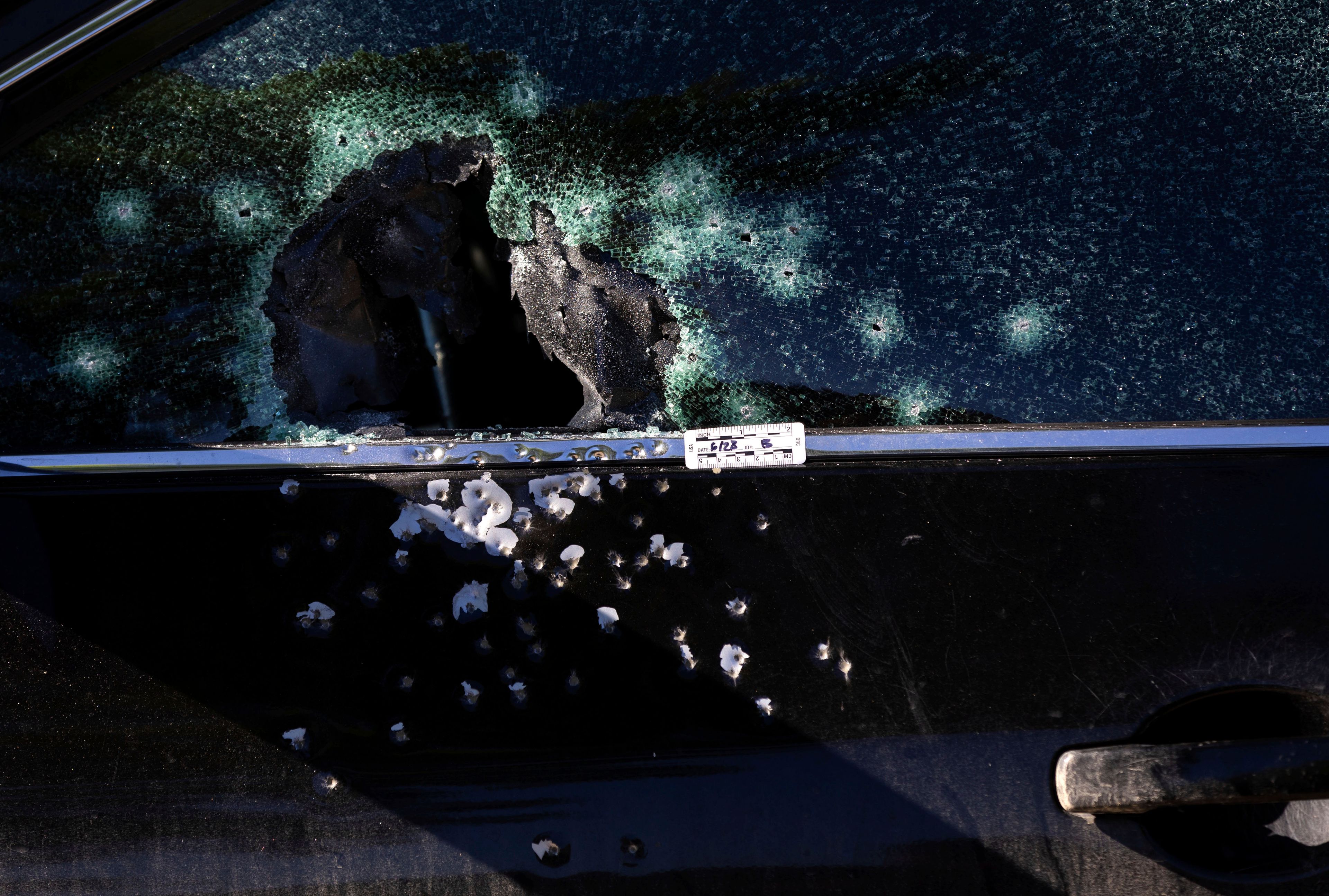 Damage to a vehicle window is seen on Saturday, June 29, 2024, after a Friday shooting in Crete, Neb., which sent several people to the hospital. (Chris Machian/Omaha World-Herald via AP)