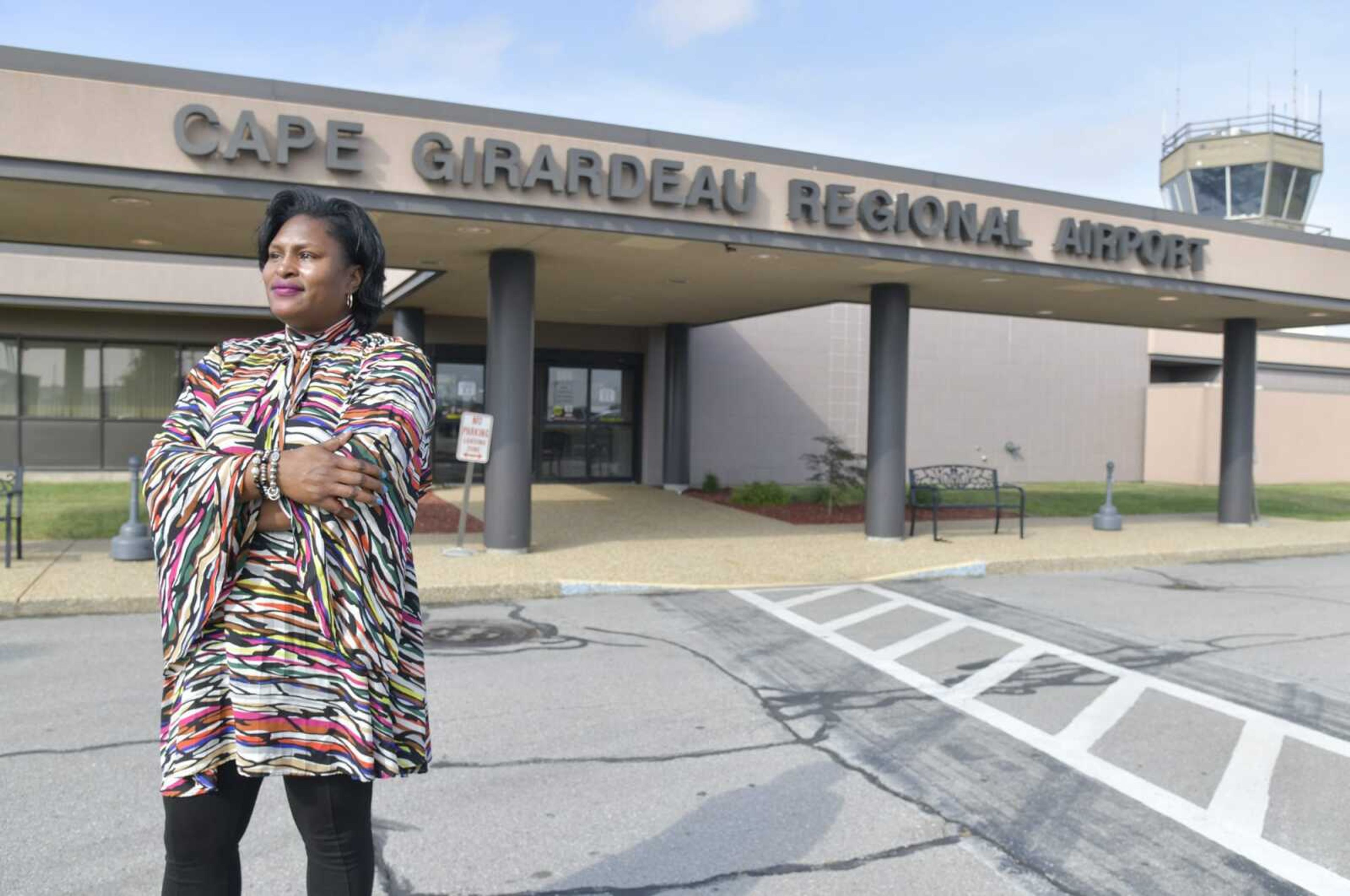 Cape Girardeau Regional Airport manager Katrina Amos poses for a portrait outside of the airport's main entrance in October.