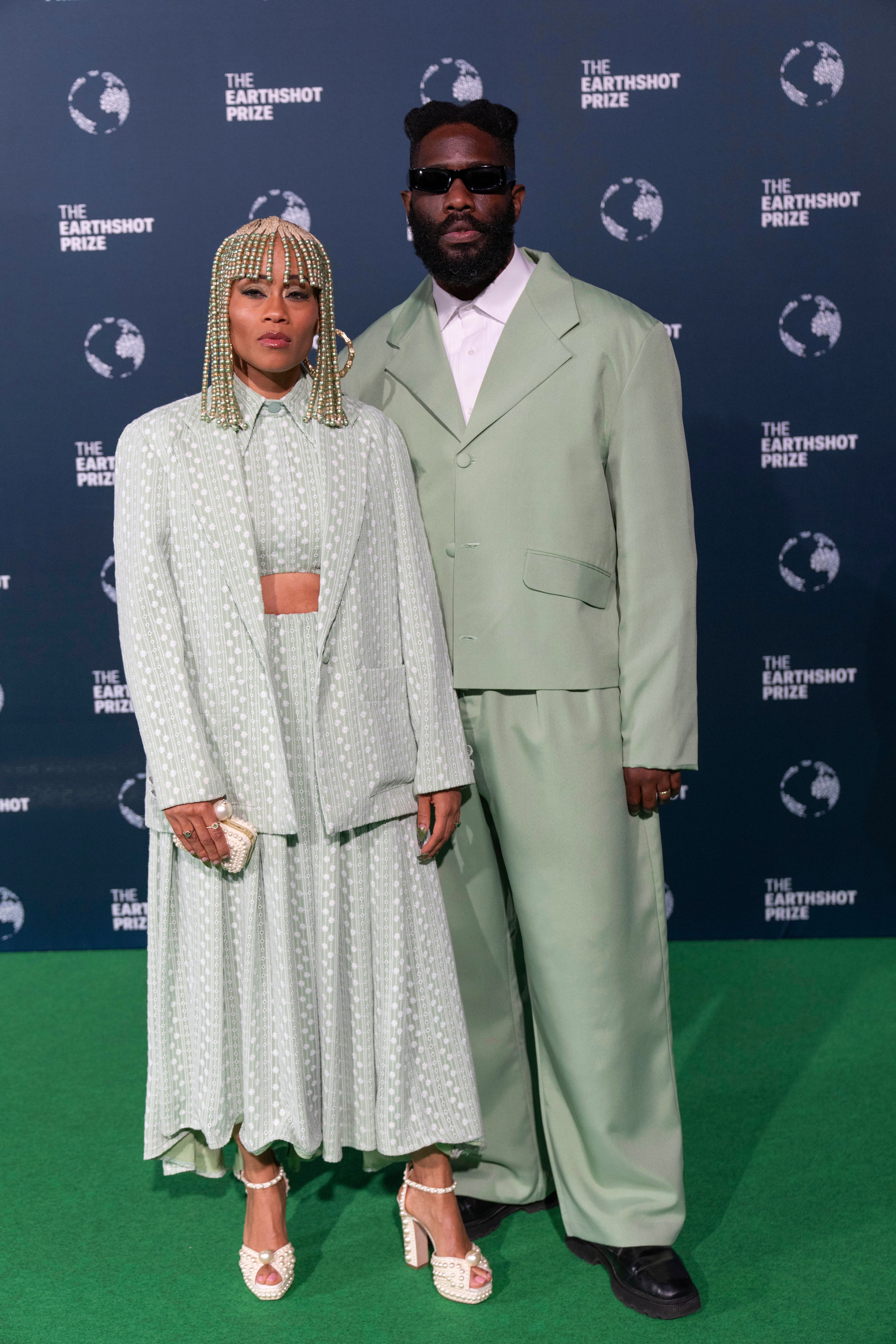 American rapper Tobe Nwigwe and his wife Martica Ivory "Fat" Nwigwe pose on the green carpet before the start of the Earthshot Prize Award ceremony in Cape Town, South Africa, Wednesday, Nov. 6, 2024. (AP Photo/Jerome Delay)