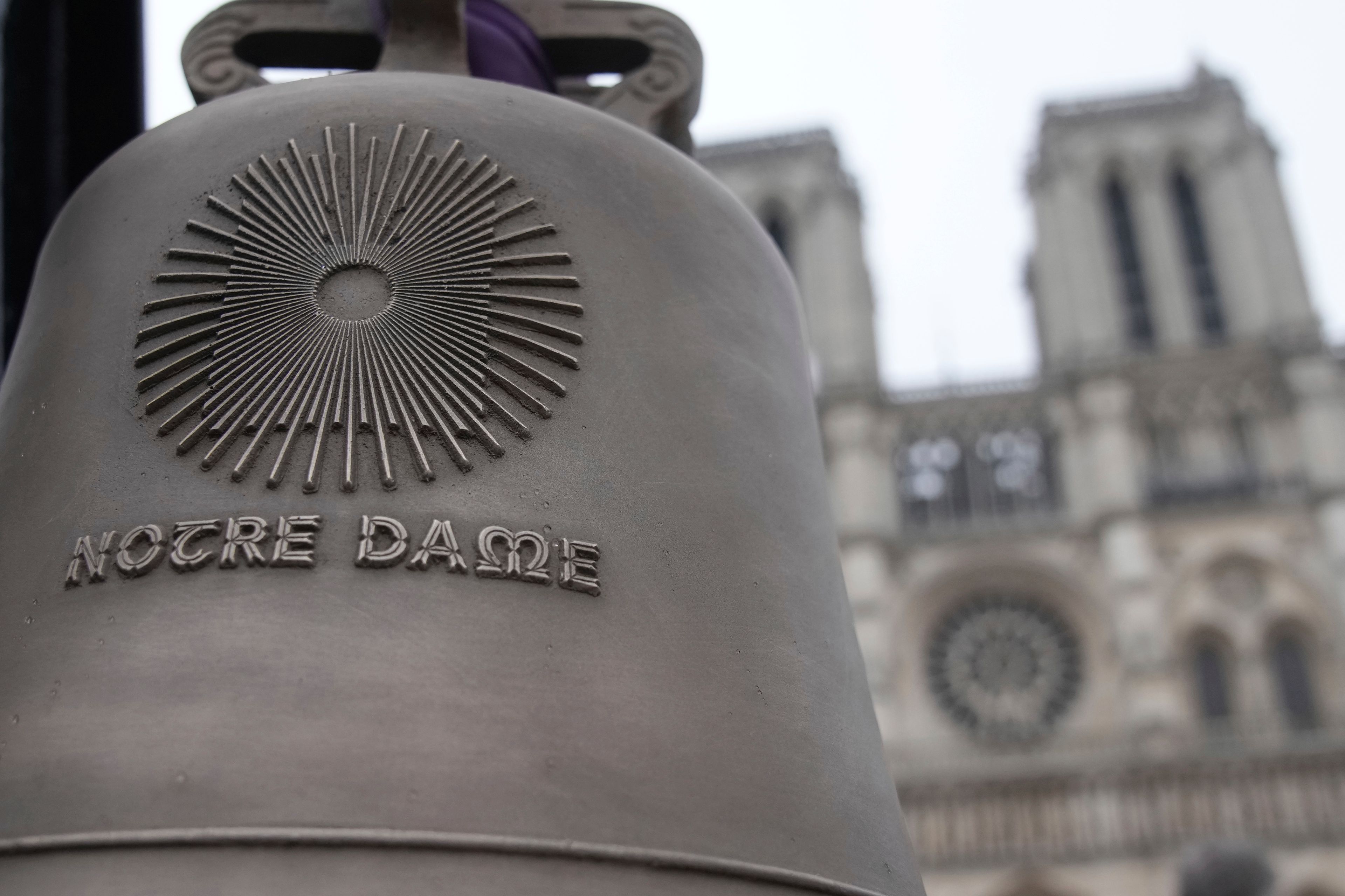 A bell is seen before its installation in Notre-Dame cathedral, ahead of the monument's grandiose reopening following a massive fire and five-year reconstruction effort, Thursday, Nov. 7, 2024 in Paris. (AP Photo/Christophe Ena)