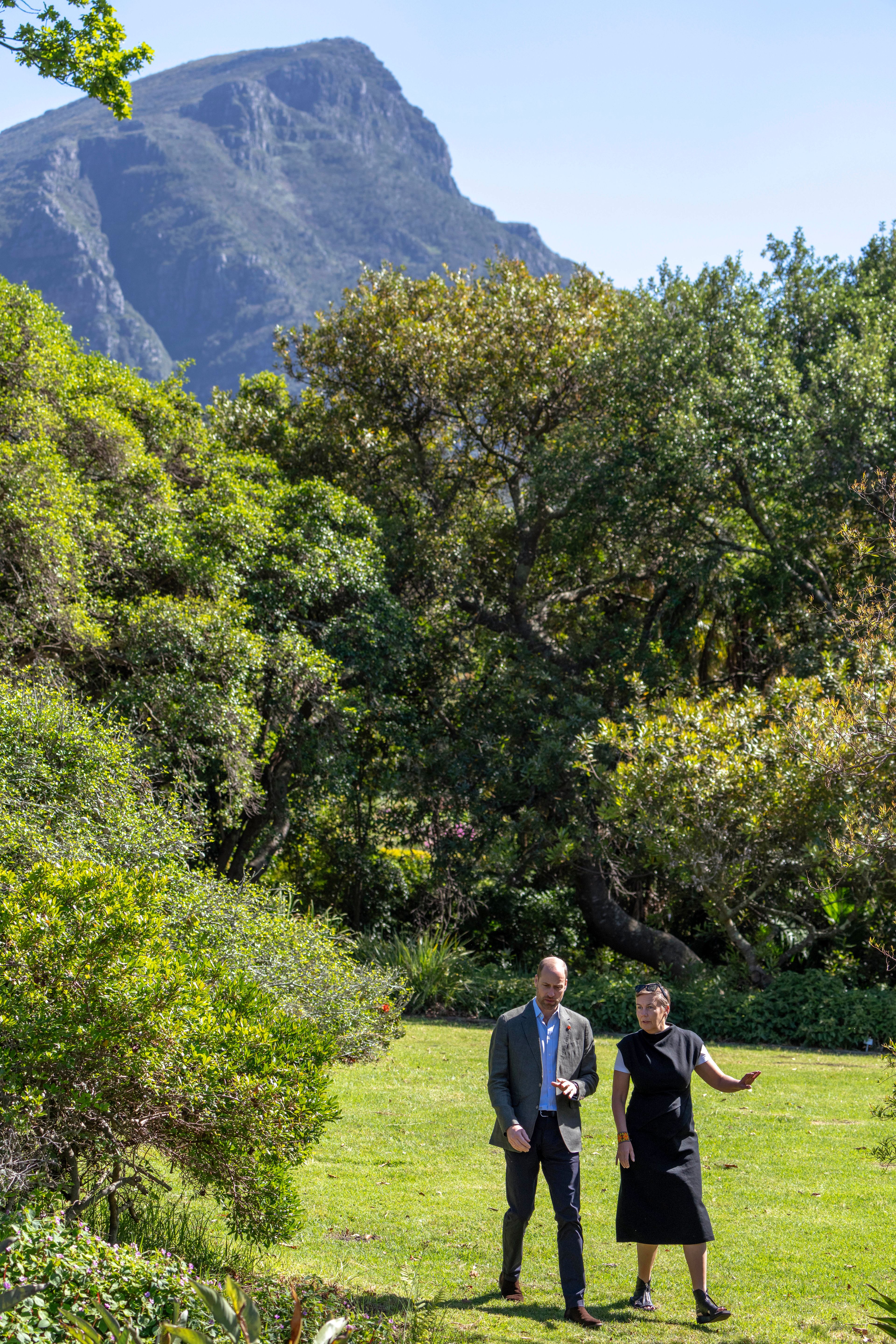 Britain's Prince William, accompanied by Earthshot Prize CEO Hannah Jones, walks through the Kirstenbosch Botanical Gardens in Cape Town, South Africa, Wednesday, Nov. 6, 2024. (AP Photo/Jerome Delay, Pool)