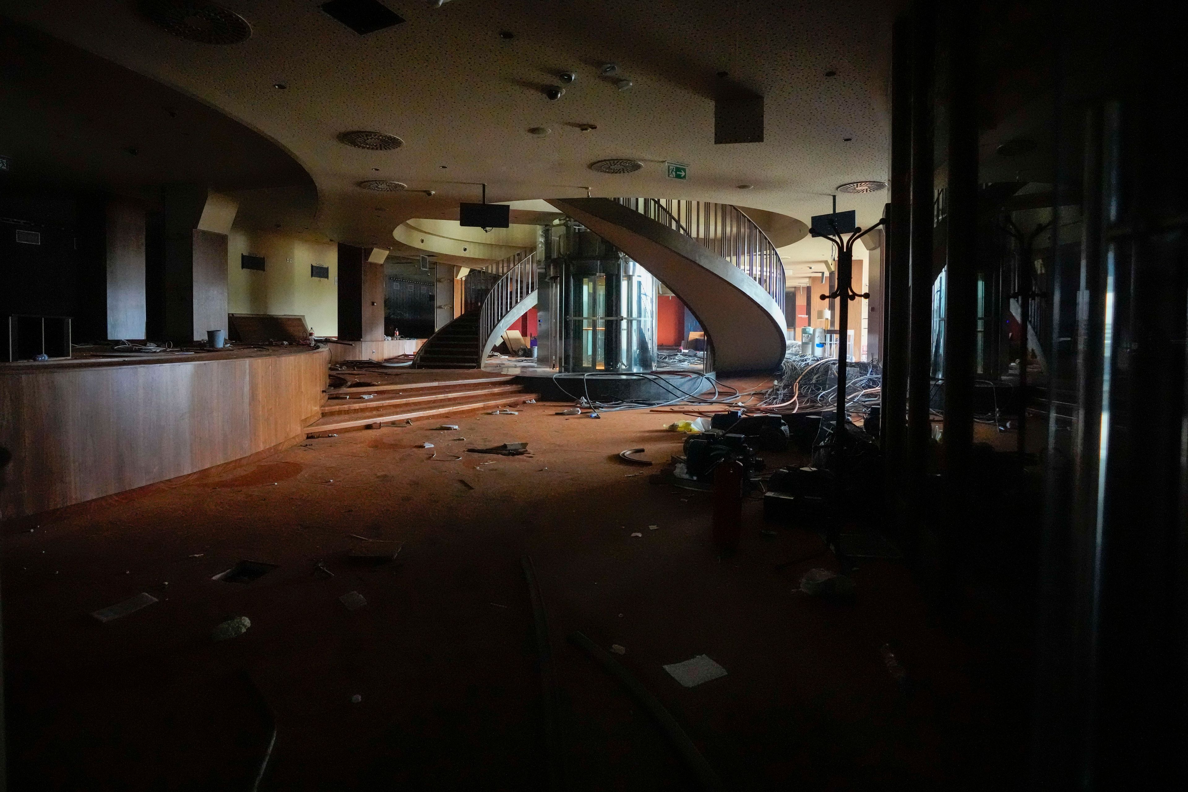 A view shows one of the halls at Hotel Yugoslavia, once a symbol of progress in the former socialist state of Yugoslavia that broke apart in the 1990s and a favorite gathering place for local residents as well as world leaders, in Belgrade, Serbia, Thursday, Oct. 3, 2024. (AP Photo/Darko Vojinovic)