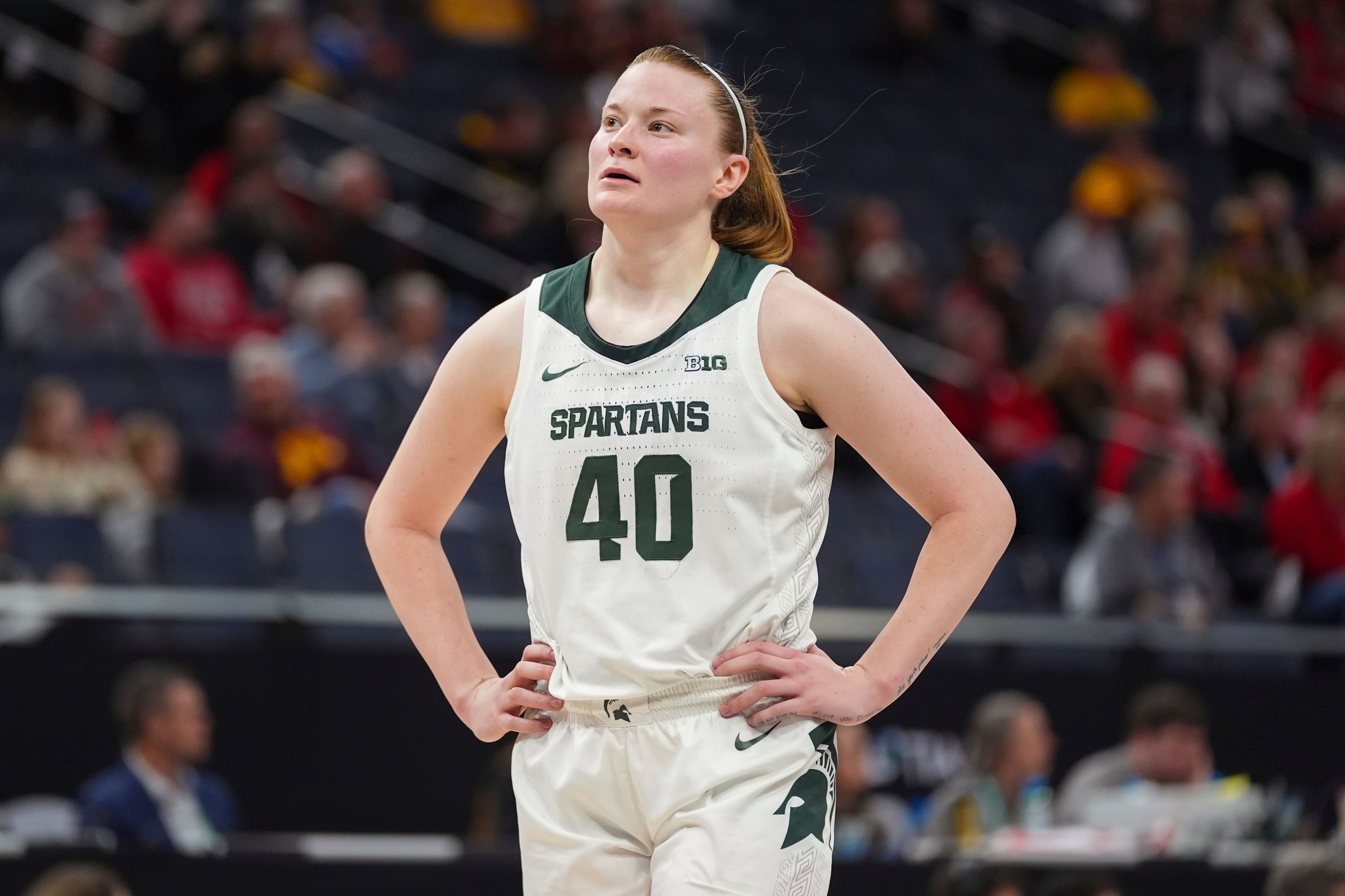 Michigan State guard Julia Ayrault walks down the court during the second half of an NCAA college basketball quarterfinal game against Nebraska at the Big Ten women's tournament Friday, March 8, 2024, in Minneapolis. (AP Photo/Abbie Parr)