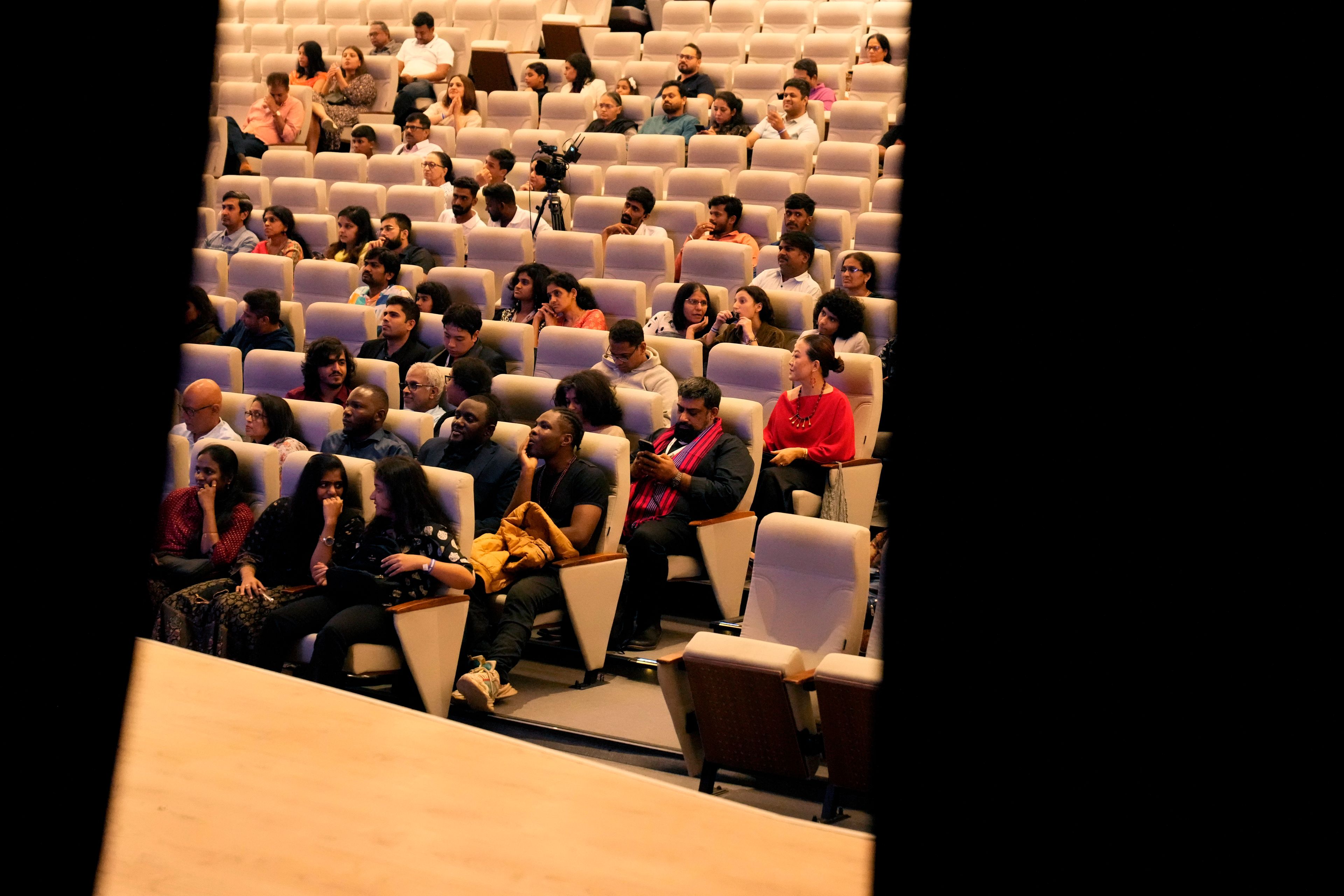 People take their seats to watch performances at the two-day Brillante Piano Festival in Bengaluru, India, Sunday, Sept. 29, 2024. (AP Photo/Aijaz Rahi)