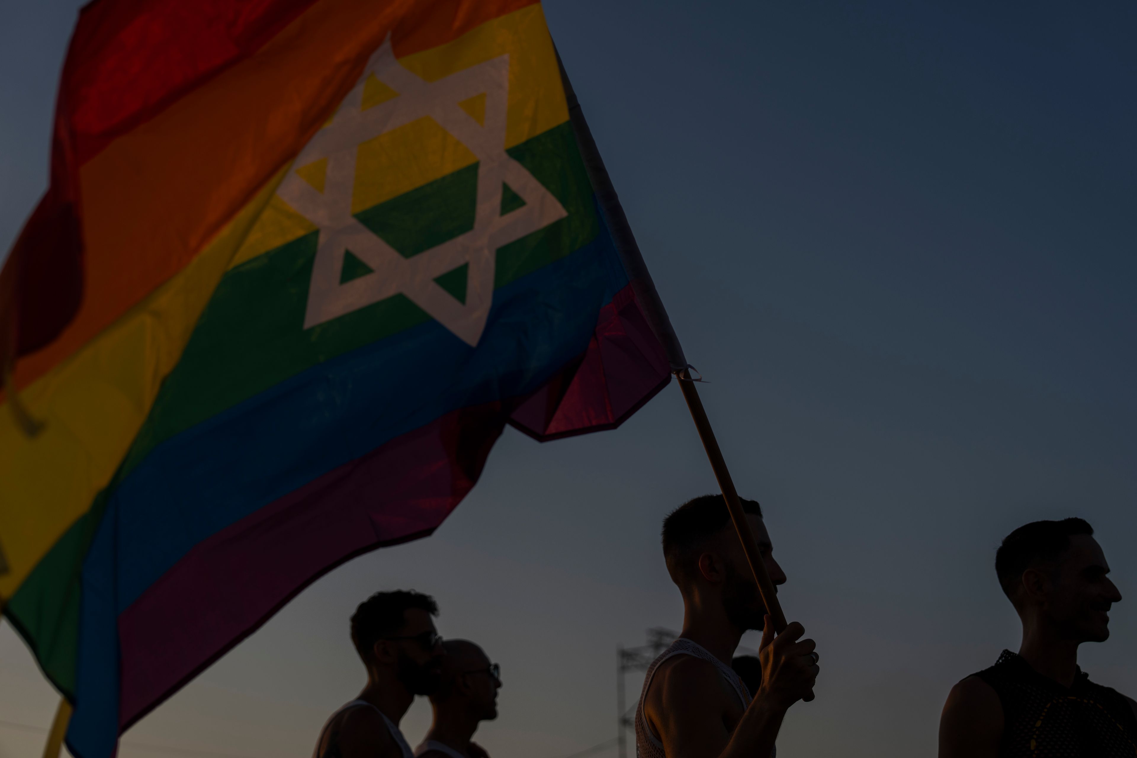 People attend a "Pride and Hope Rally" LGBTQ+ Pride event in Tel Aviv, Israel, Thursday, June 6, 2024. (AP Photo/Ariel Schalit)