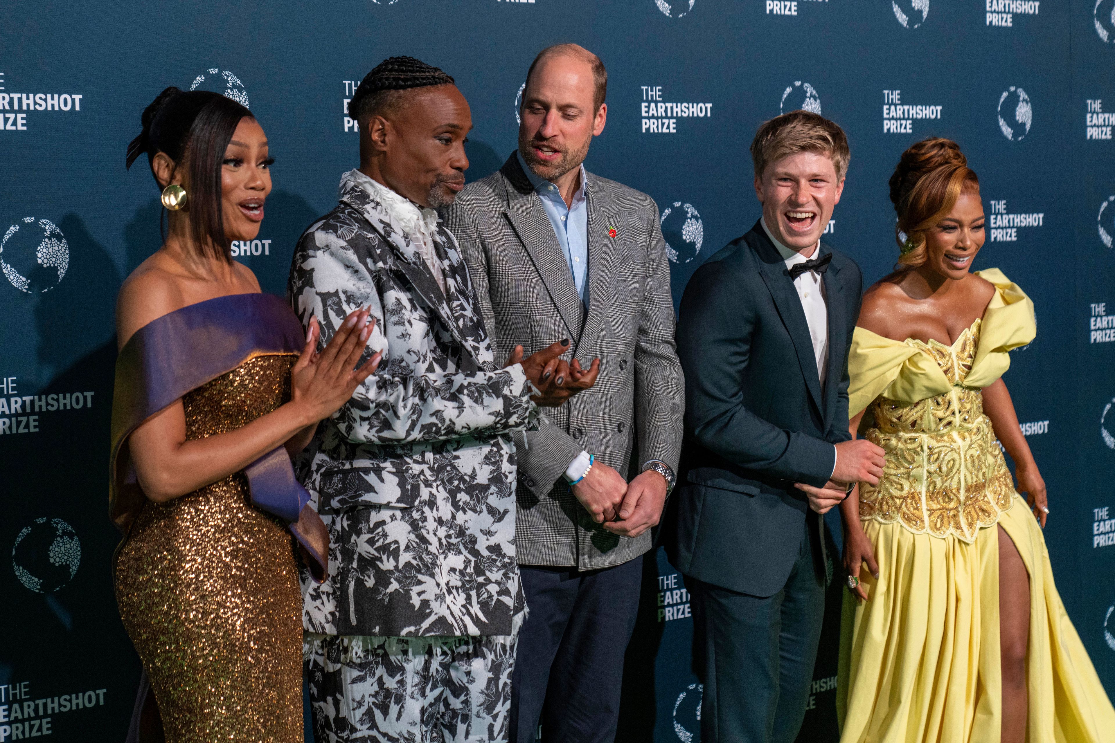 Britain's Prince William, center, laughs with, from left, Bonang Matheba, Billy Porter, Robert Irwin and Nomzamo Mbatha before the start of the Earthshot Prize Award ceremony in Cape Town, South Africa, Wednesday, Nov. 6, 2024. (AP Photo/Jerome Delay)