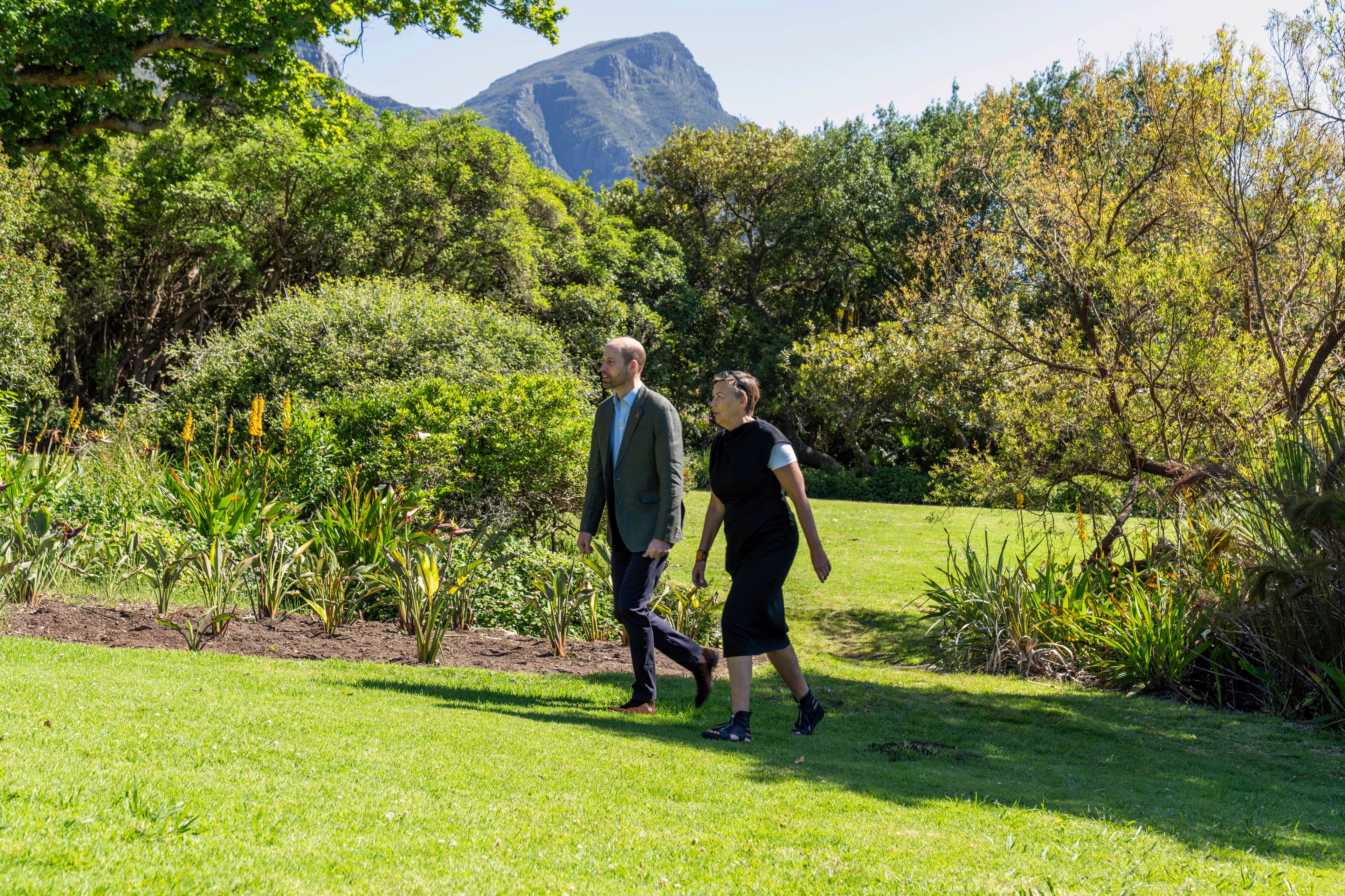 Britain's Prince William, accompanied by Earthshot Prize CEO Hannah Jones, walks through the Kirstenbosch Botanical Gardens in Cape Town, South Africa, Wednesday, Nov. 6, 2024. (AP Photo/Jerome Delay, Pool)