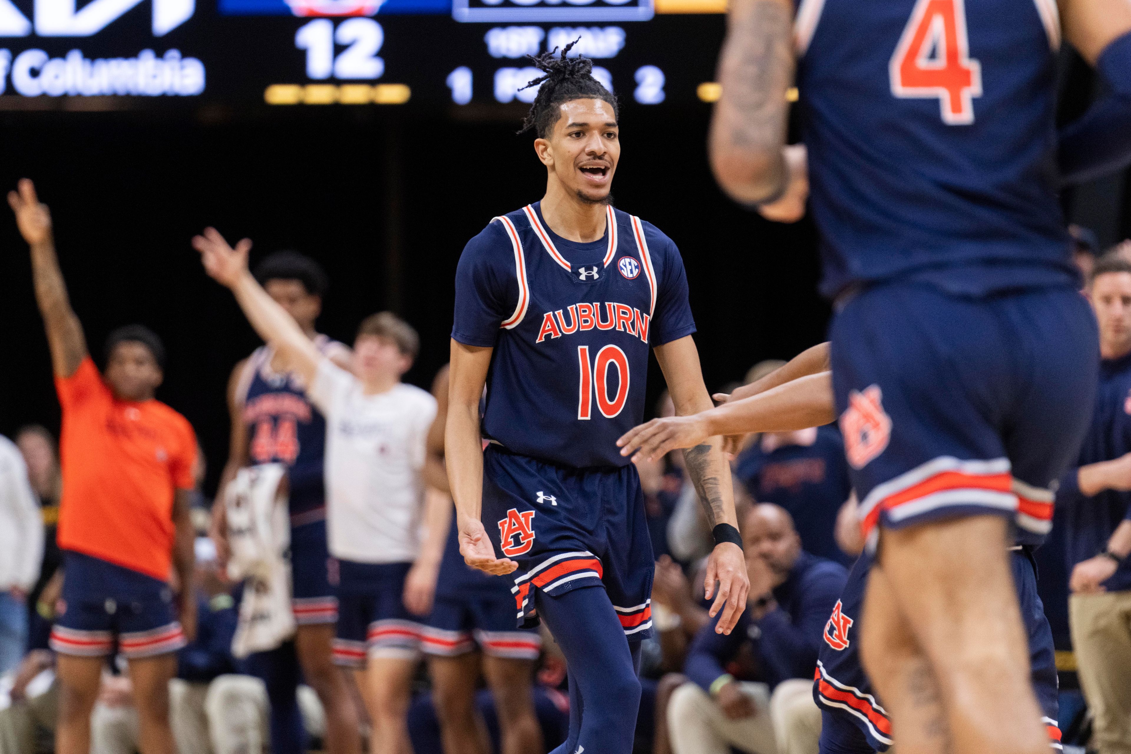 Auburn's Chad Baker-Mazara celebrates a basket against Missouri during the first half of an NCAA college basketball game Tuesday, March 5, 2024, in Columbia, Mo. (AP Photo/L.G. Patterson)