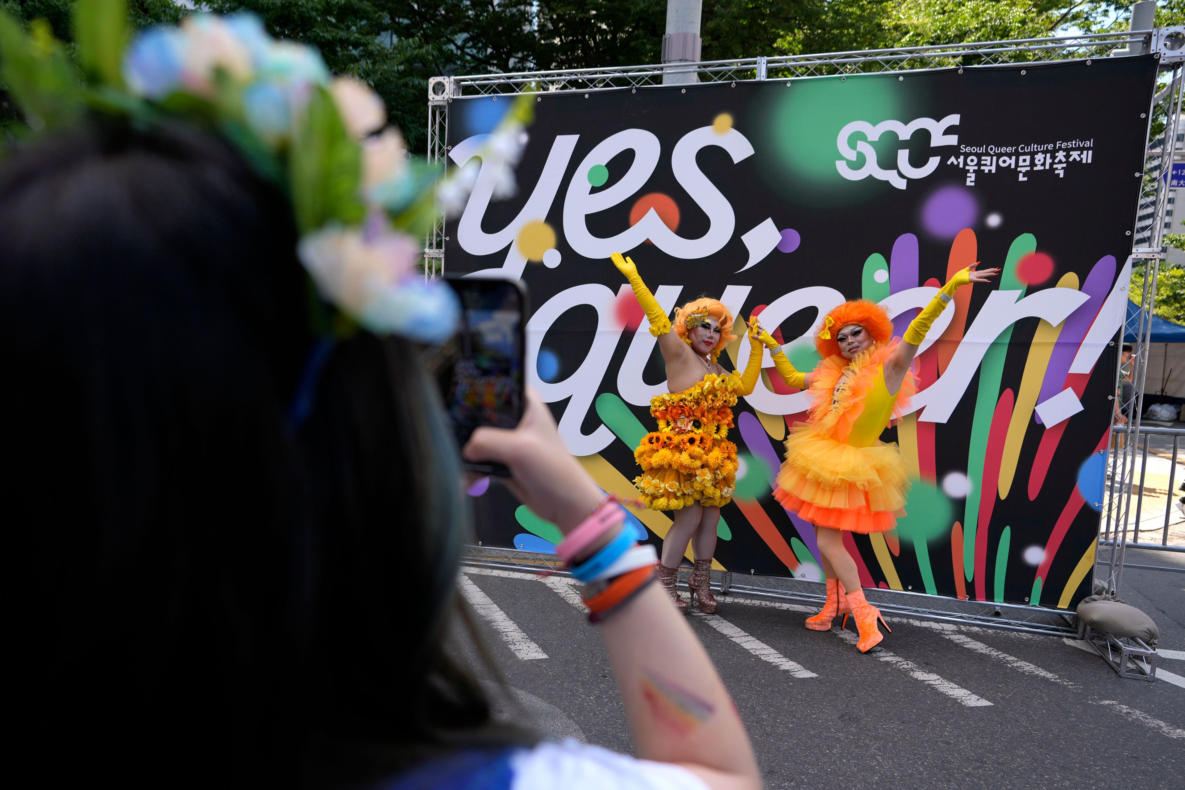 Participants pose for a souvenir photo during the 25th Seoul Queer Culture Festival, which is held from May 27 to June 18, in Seoul, South Korea, Saturday, June 1, 2024. (AP Photo/Lee Jin-man)