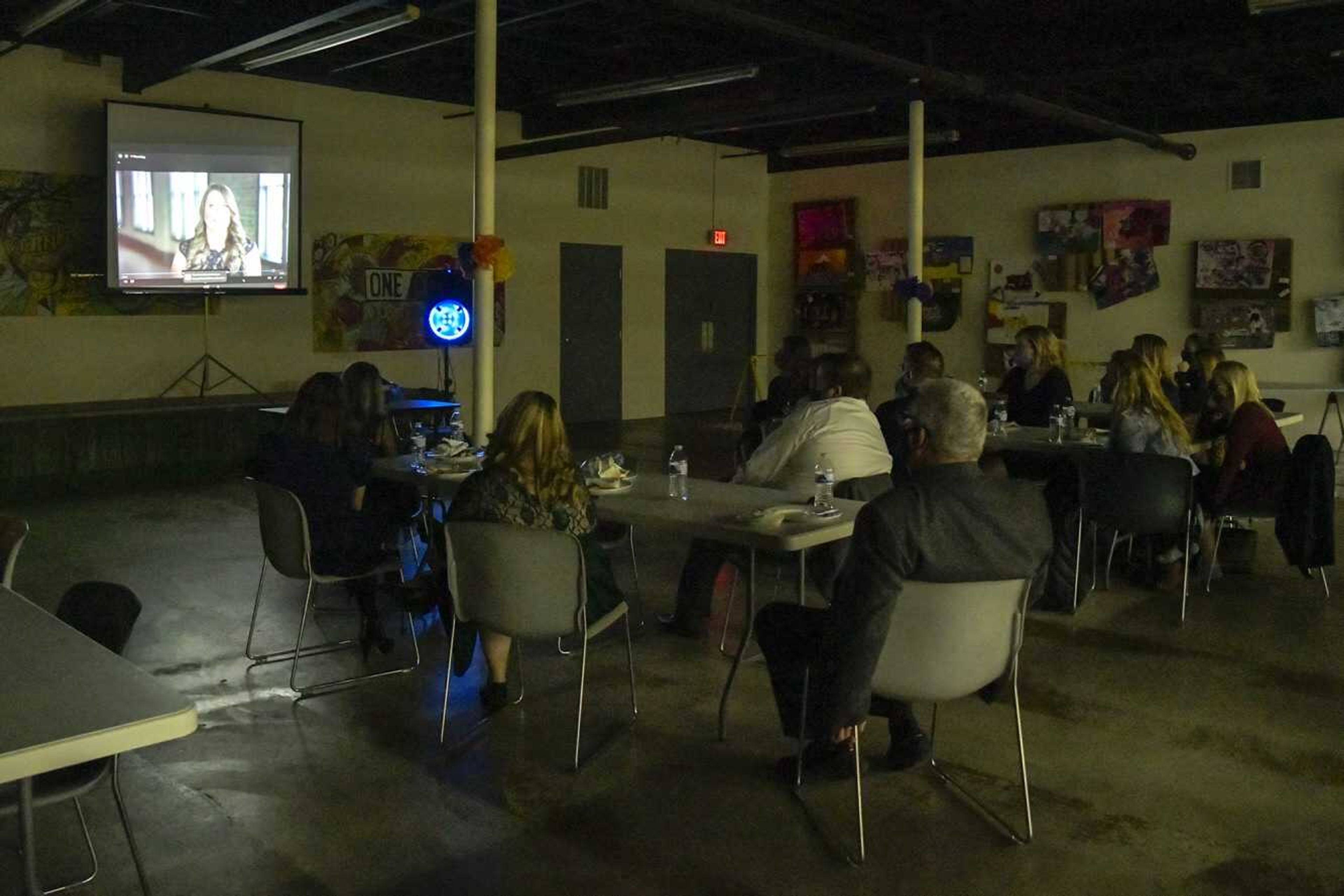 Jefferson Elementary school counselor Olivia Carter, some of her fellow co-workers and other guests watch the video of her remarks during the 2021 School Counselor of the Year Gala put on by the American School Counselor Association at One City in Cape Girardeau on Thursday.
