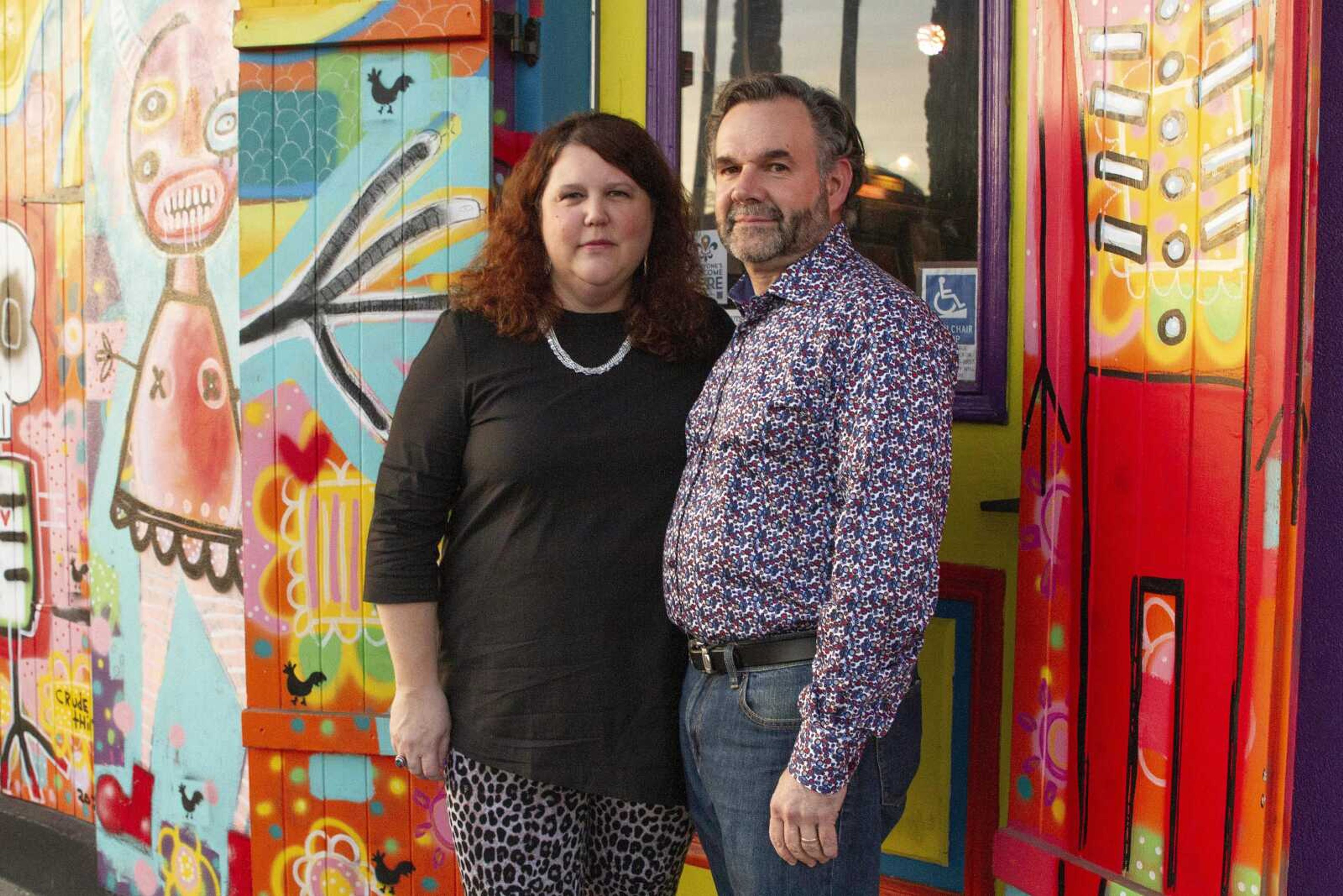 Jennifer and Matt Johnson pose for a portrait in New Orleans, Friday, Jan. 29, 2021. They bought what is now the Carnaval Lounge on St. Claude in summer 2019, and the 2020 Mardi Gras season was their first as business owners. The lounge was becoming popular for live music and Brazilian food.