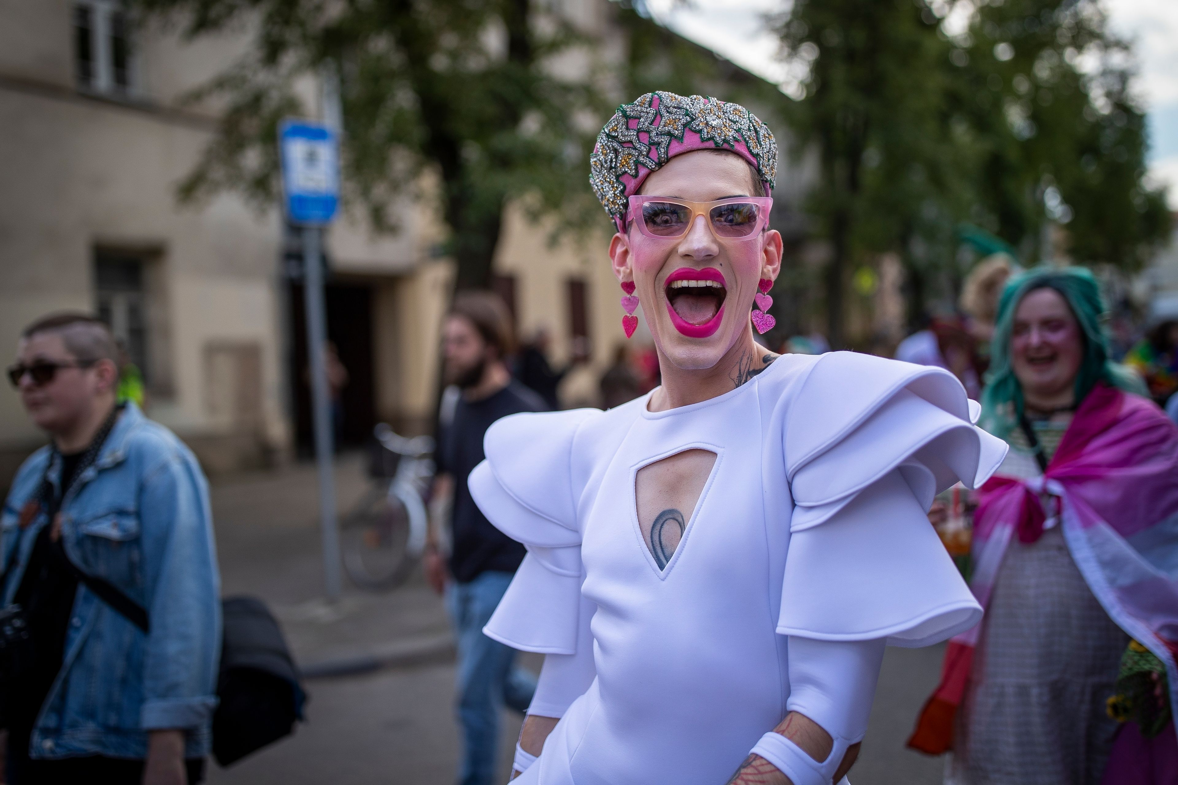 A reveler takes part in the Pride March in Vilnius, Lithuania, Saturday, June 8, 2024. (AP Photo/Mindaugas Kulbis)