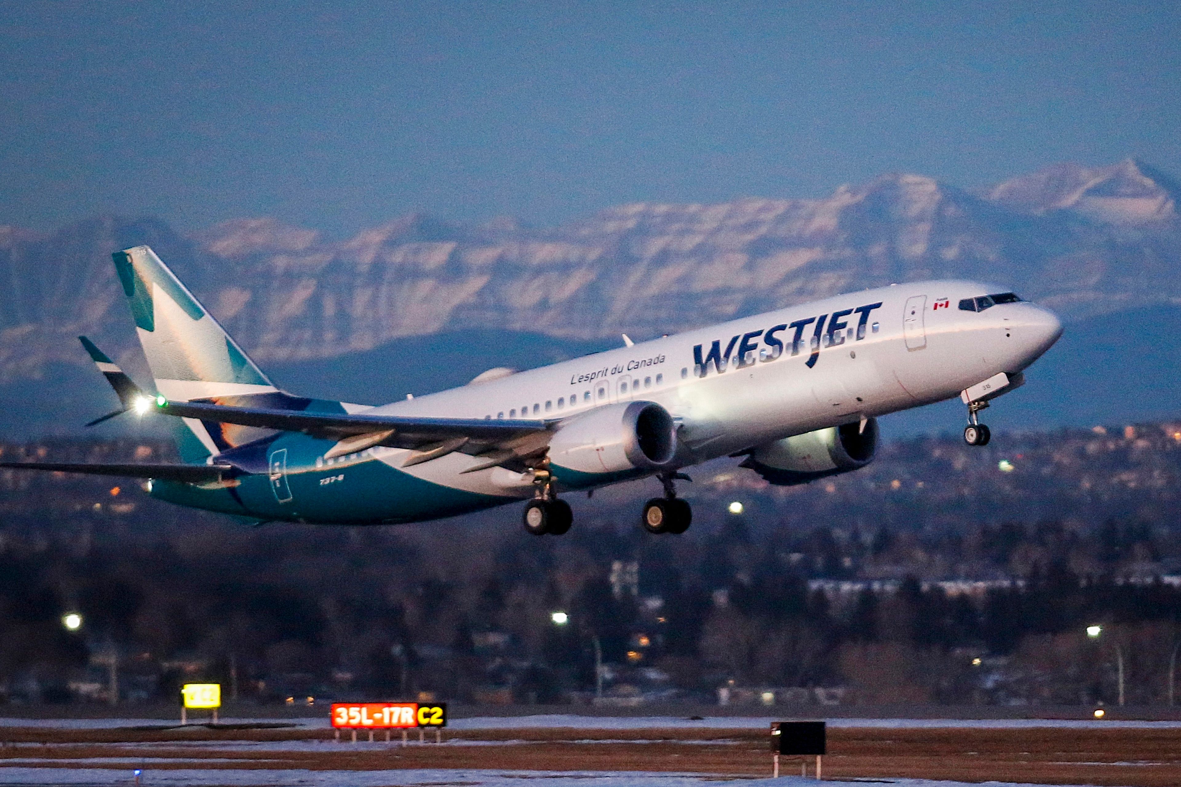 FILE - A westJet airplane takes off in Calgary, Alta., Jan. 21, 202. Mechanics at the Canadian airline WestJet say they are dropping plans to begin a strike now that the airline has agreed to resume negotiations on a new collective-bargaining agreement. Members of the Aircraft Mechanics Fraternal Association had been preparing to walk off the job on Thursday night. (Jeff McIntosh/The Canadian Press via AP, File)