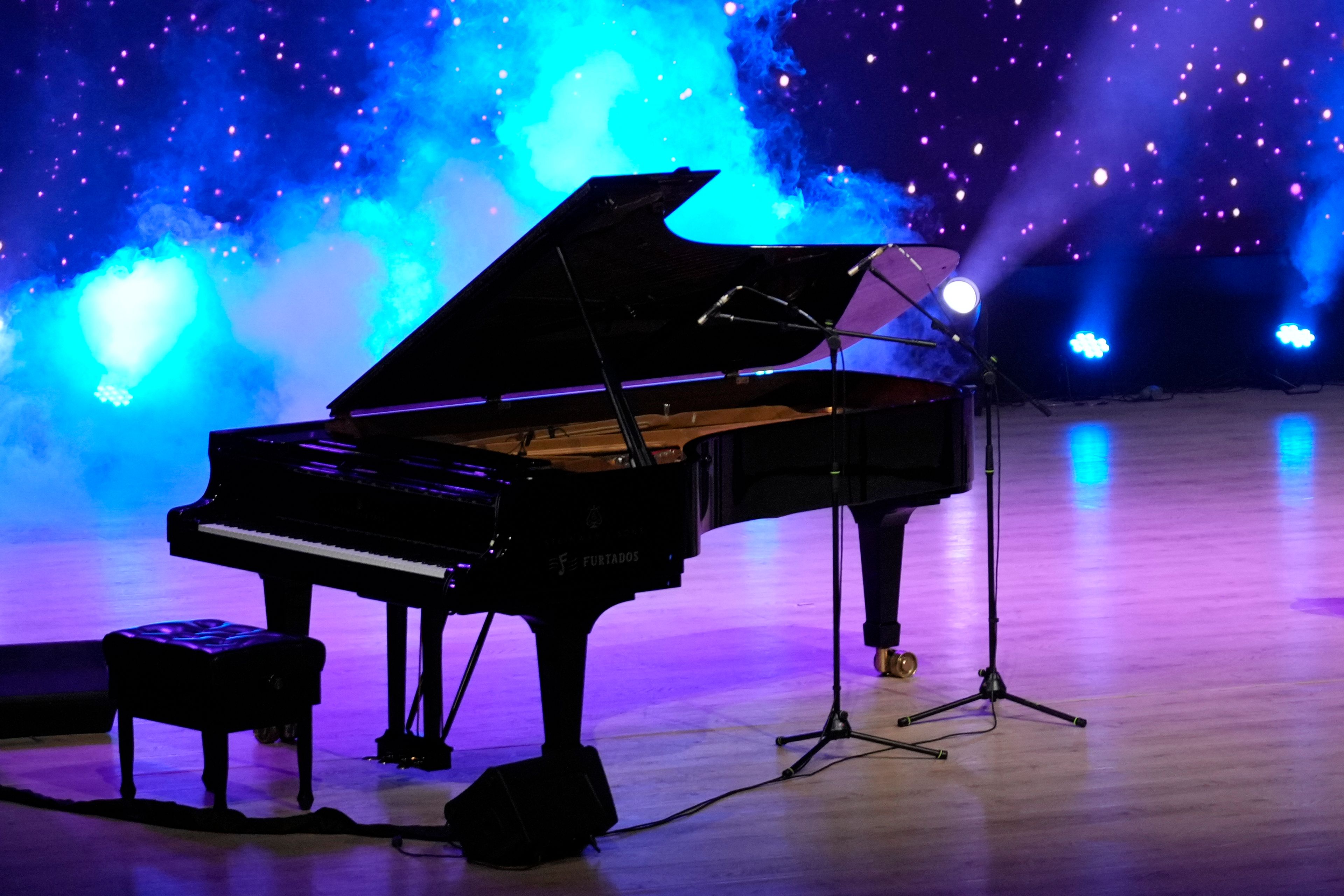 The performance piano stands on stage after the final performance of Takosangba Pongen, 27, a blind pianist, at the two-day Brillante Piano Festival in Bengaluru, India, Sunday, Sept. 29, 2024. (AP Photo/Aijaz Rahi)