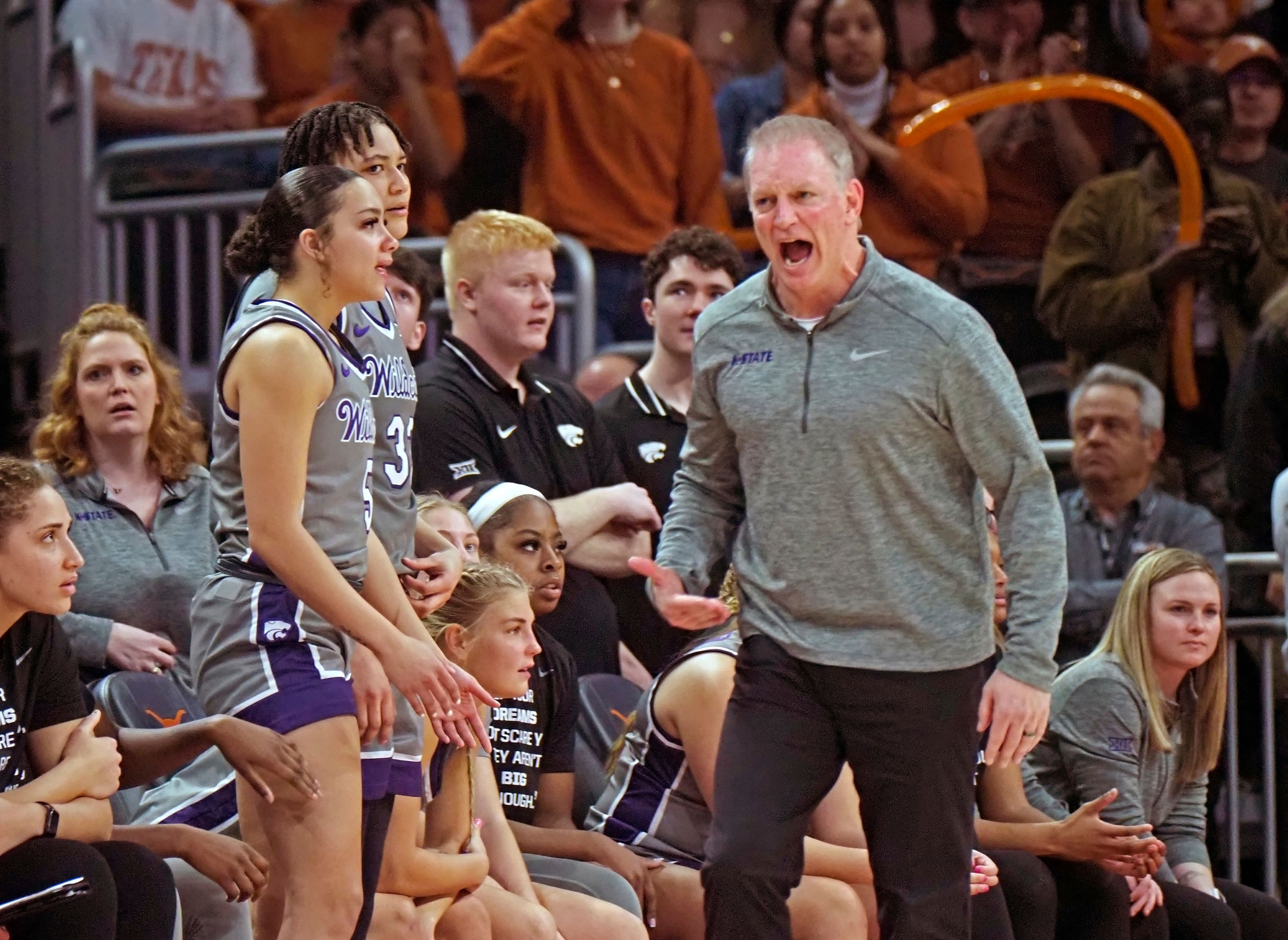 Kansas State head coach Jeff Mittie, right, reacts to the absence of a foul call against Texas during the second half of an NCAA college basketball game, Sunday, Feb. 4, 2024, in Austin, Texas. Texas won 61-54. (AP Photo/Michael Thomas)