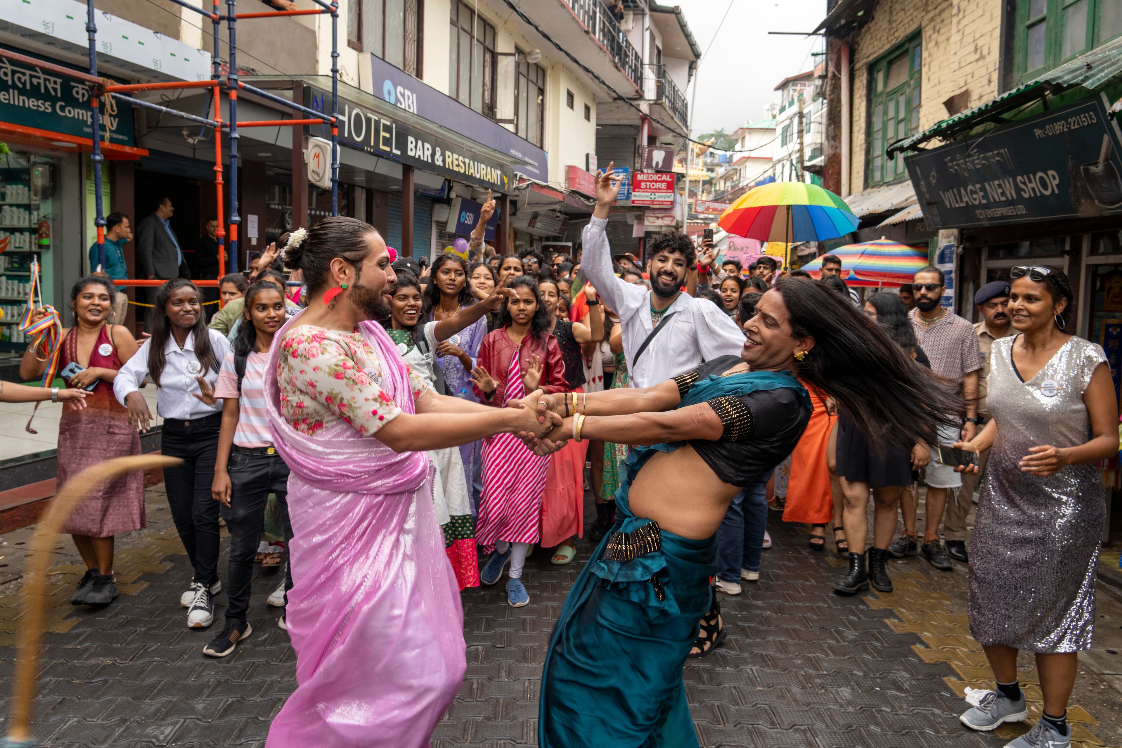 Activists and supporters of the LGBTQ community participate in a Pride walk in Dharamshala, India, Sunday, June 30, 2024. (AP Photo/Ashwini Bhatia)