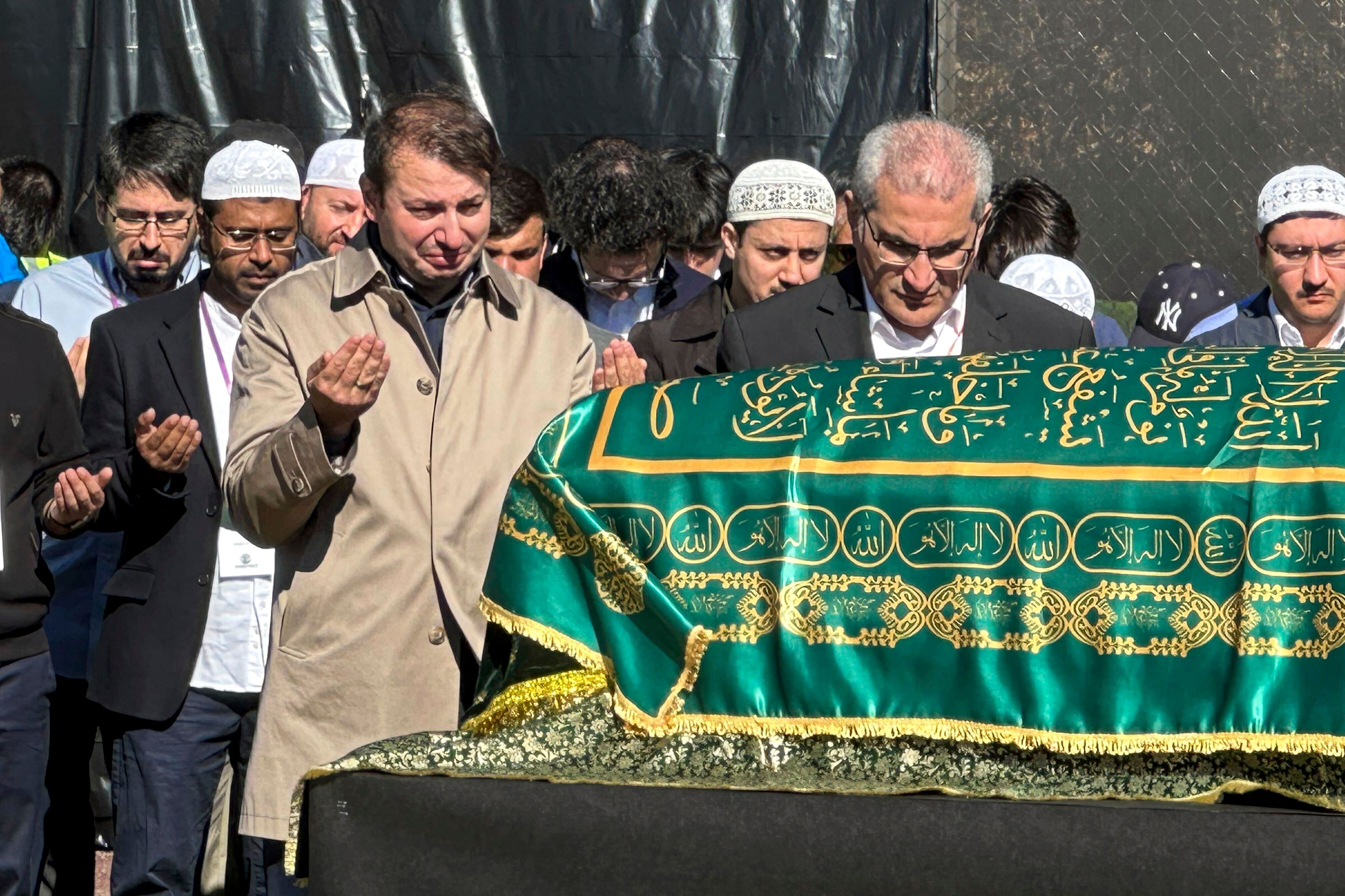 A casket bearing the body of Fethullah Gülen, a Muslim cleric living in exile in the United States who faced unproven allegations that he orchestrated a failed 2016 coup in Turkey, sits in Skylands Stadium in Augusta, N.J., where thousands gathered for funeral prayers, Thursday, Oct. 24. 2024. (AP Photo/Mike Rubinkam)