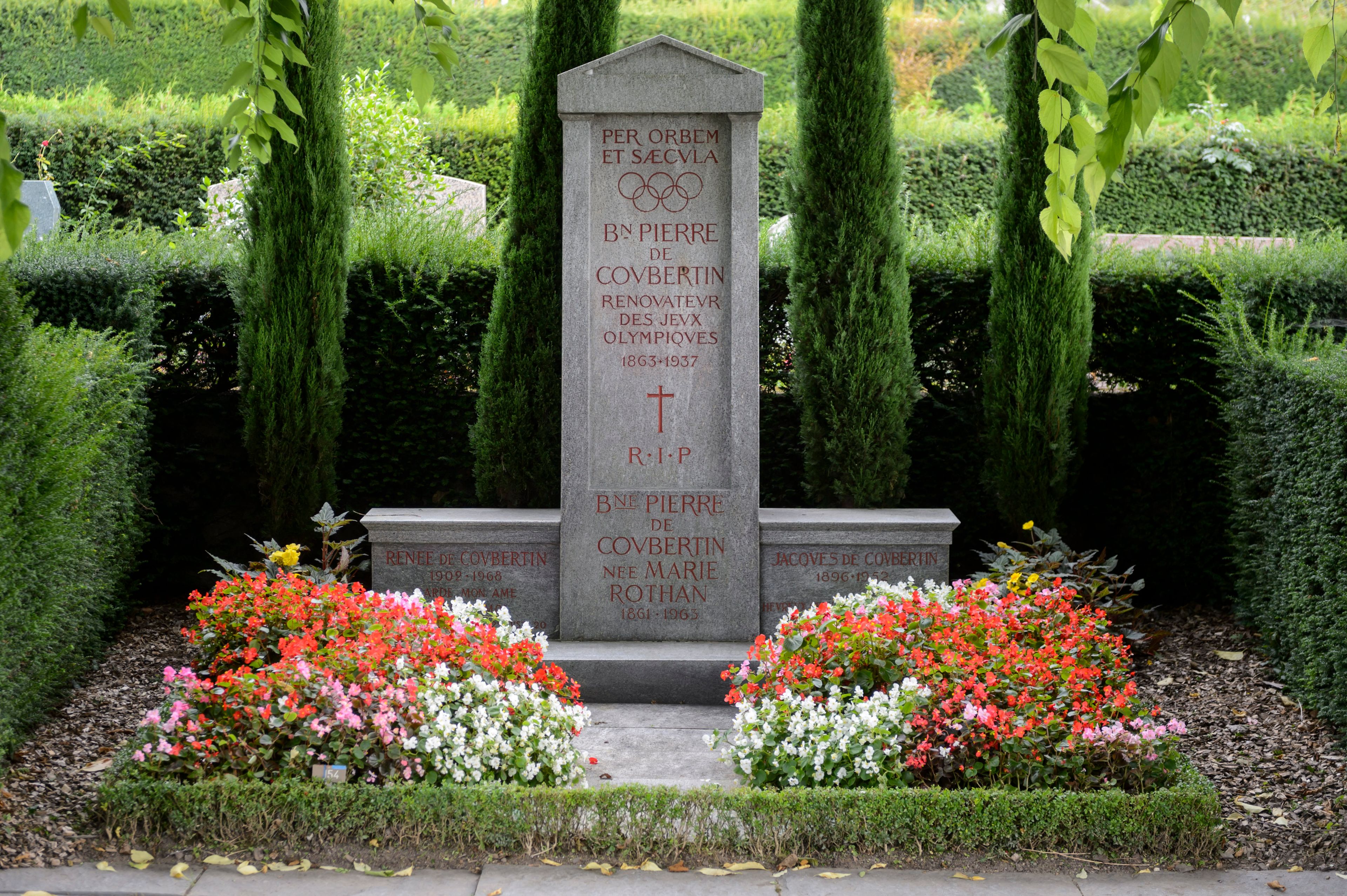 FILE - The grave of International Olympic Committee (IOC) founder baron Pierre de Coubertin is photographed at the Bois-de-Vaux cemetery, in Lausanne, Switzerland, Thursday, Sept.11, 2014. Coubertin envisioned the Olympics as a pacifist exercise that could foster international cooperation and peace, especially in the wake of France's defeat in the Franco-Prussian War. (AP Photo/Keystone,Laurent Gillieron, File)